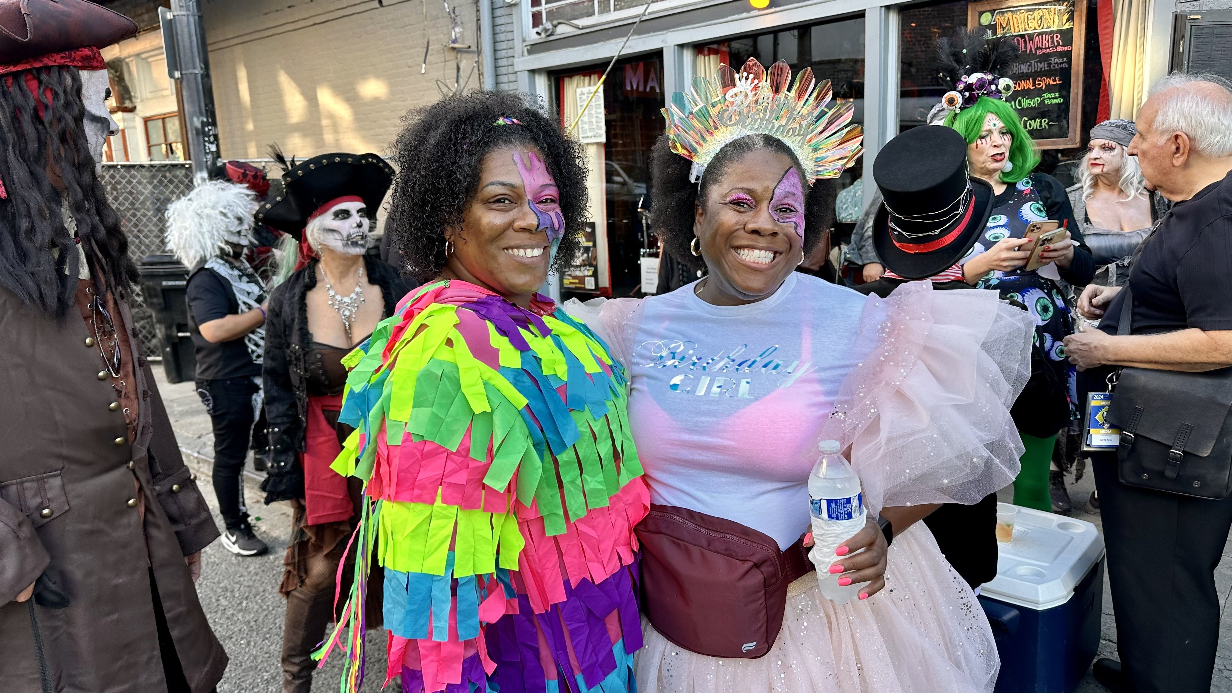 Image shows two women in costumes.