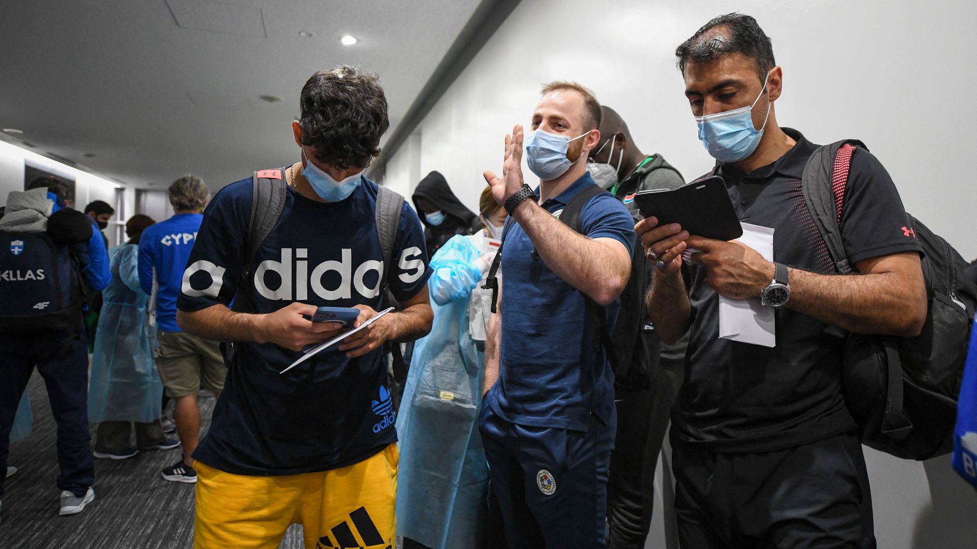 Three members of the Olympic refugee team