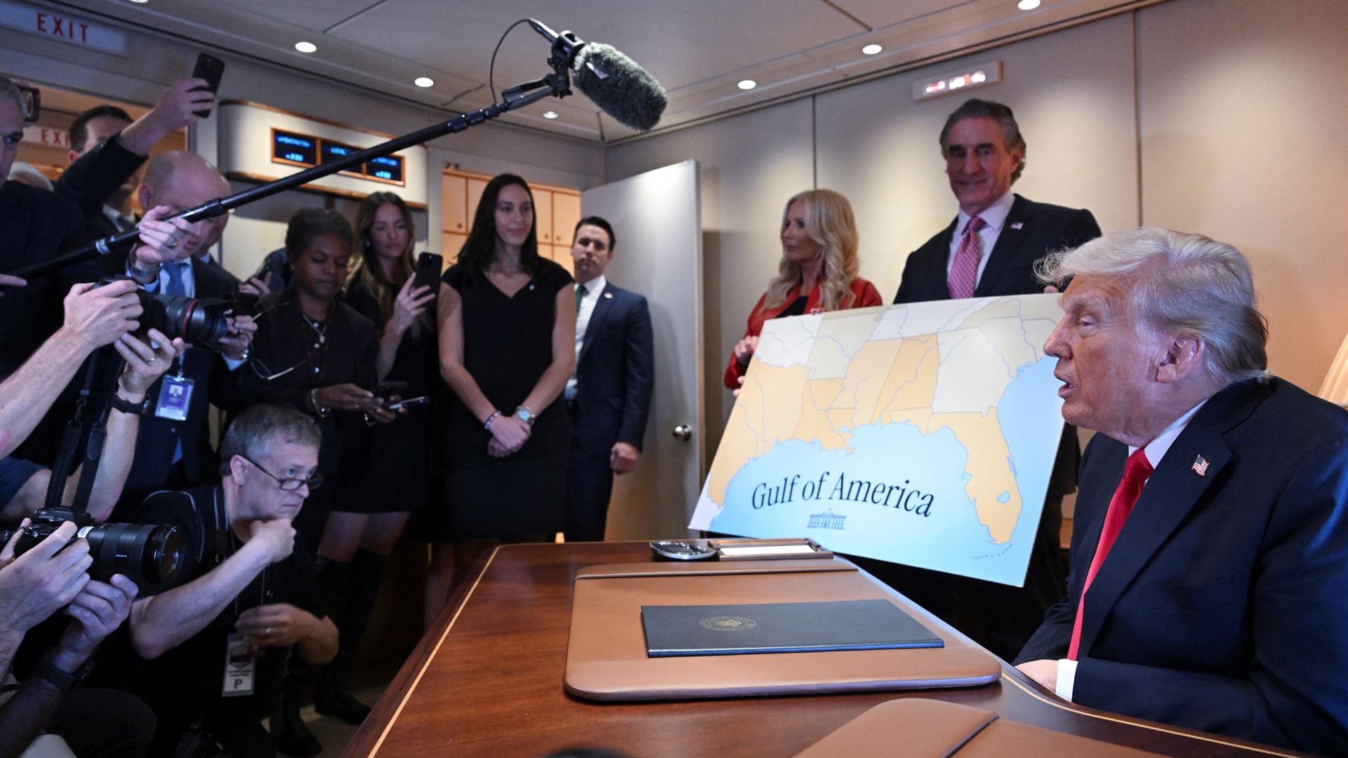 President Trump signs a proclamation for Gulf of America Day, aboard Air Force One on Feb. 9. Photo: Roberto Schmidt/AFP via Getty Images