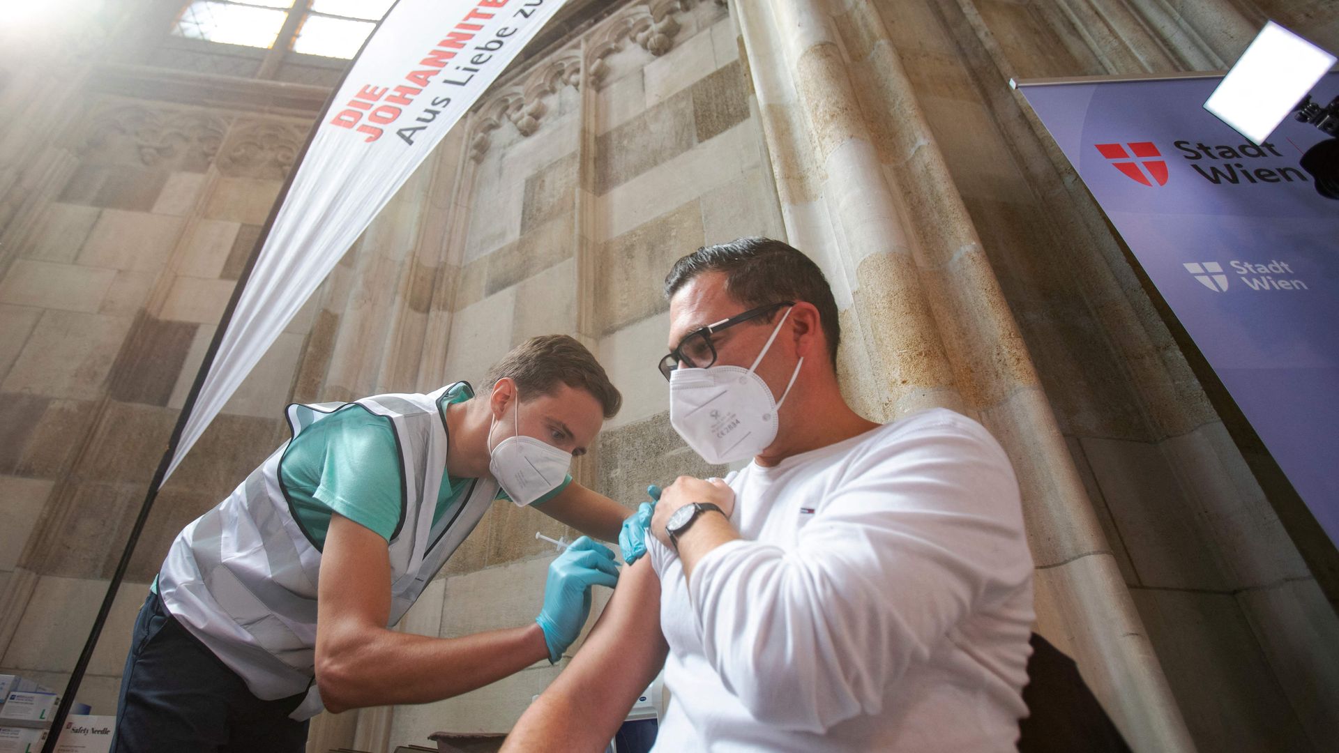 A man gets a vaccine at the vaccination center installed at the Barbara Chapel of the famous St Stephen's Cathedral in Vienna on August 11.