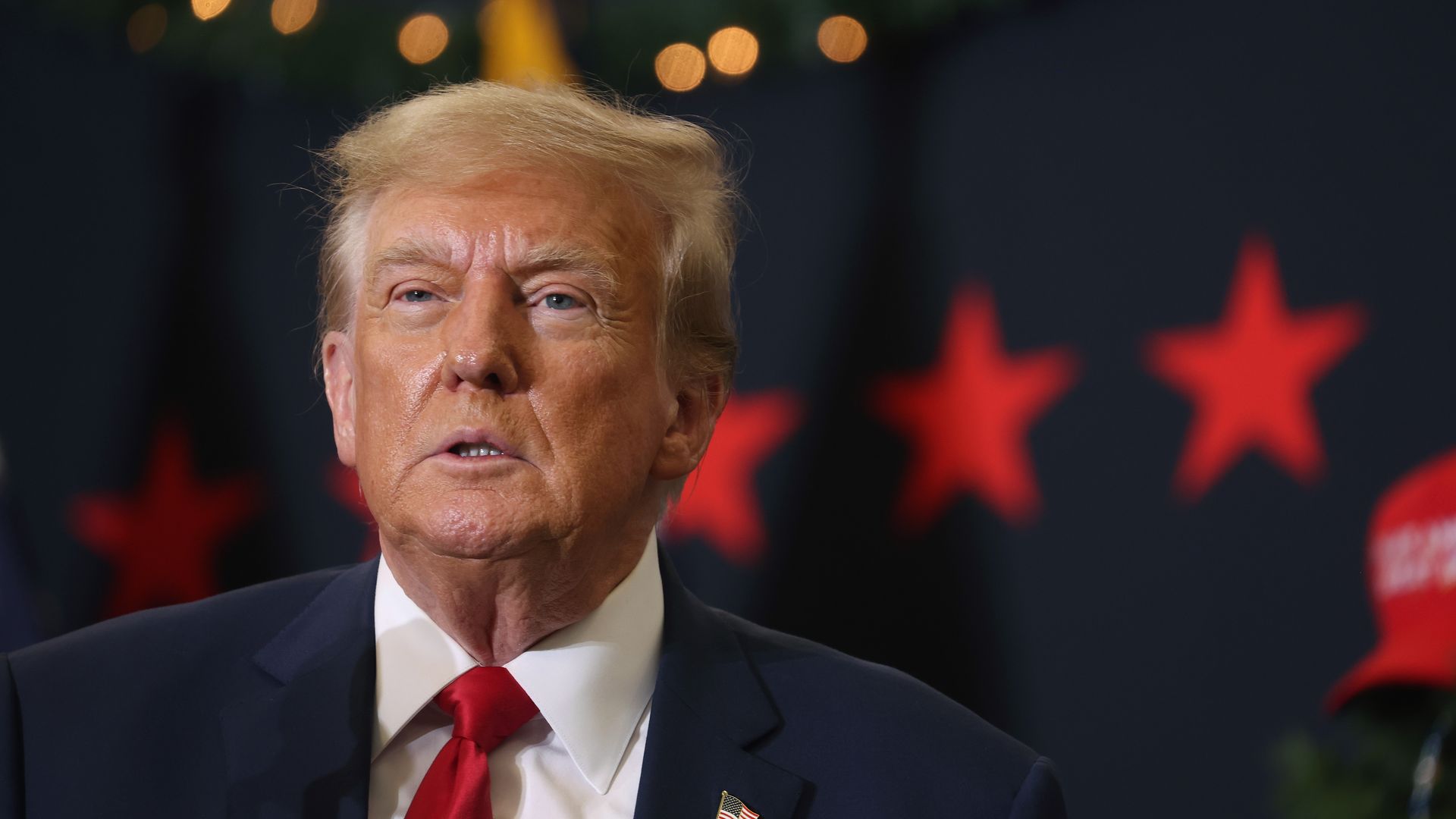 Republican presidential candidate and former U.S. President Donald Trump looks on during a campaign event on December 19, 2023 in Waterloo, Iowa.