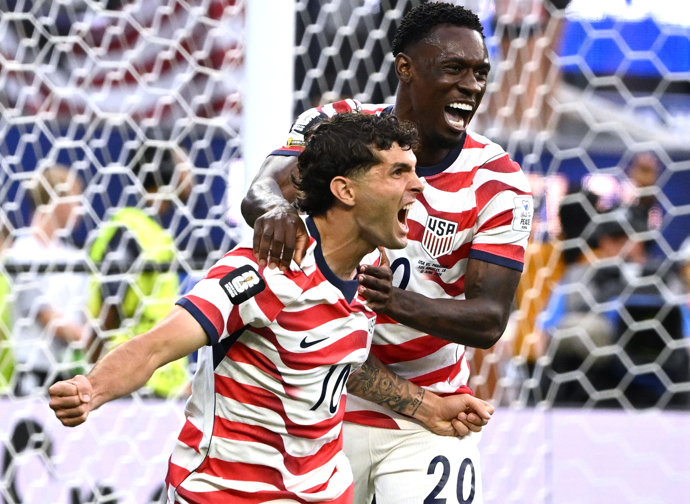 U.S. soccer players celebrate a goal