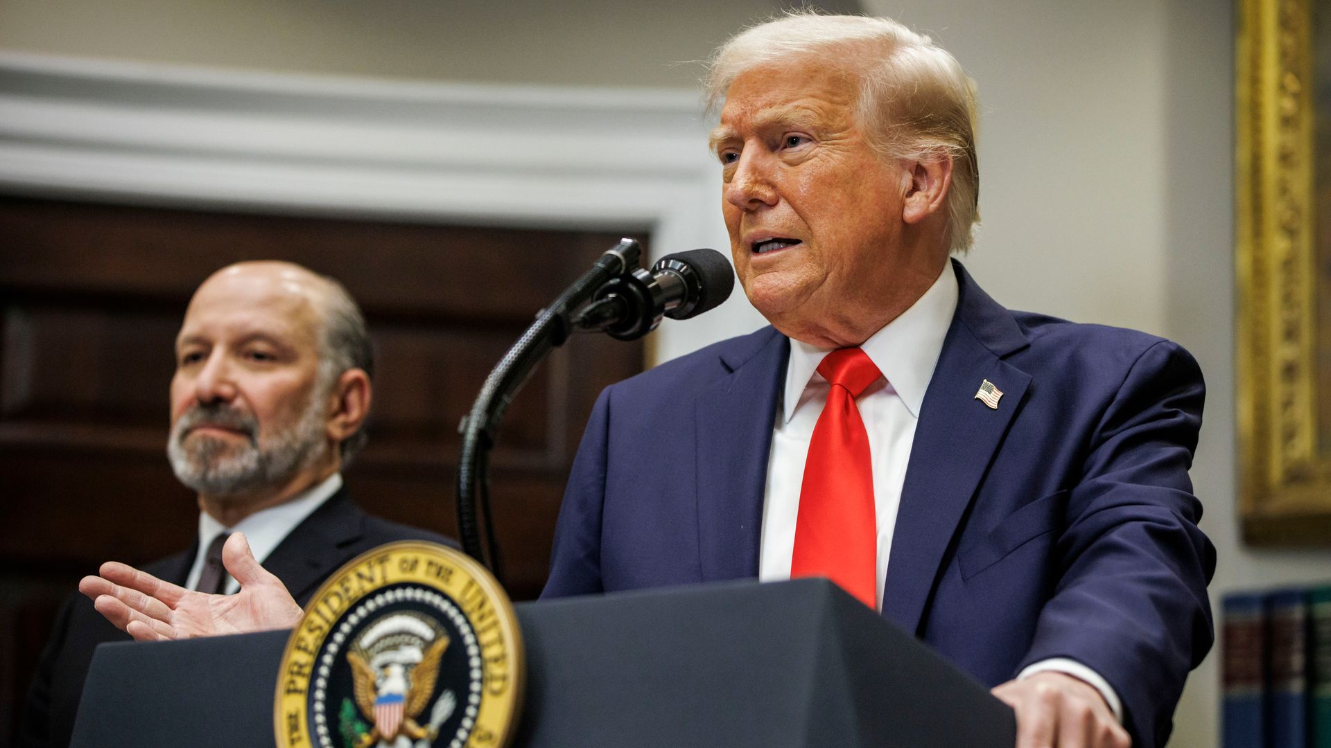 President Trump addresses a news event at the White House. 