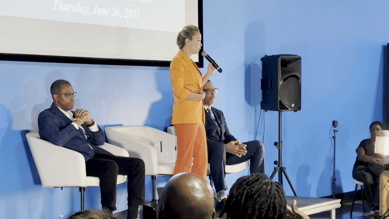 Image shows Helena Moreno talking while Arthur Hunter and Oliver Thomas sit beside her.