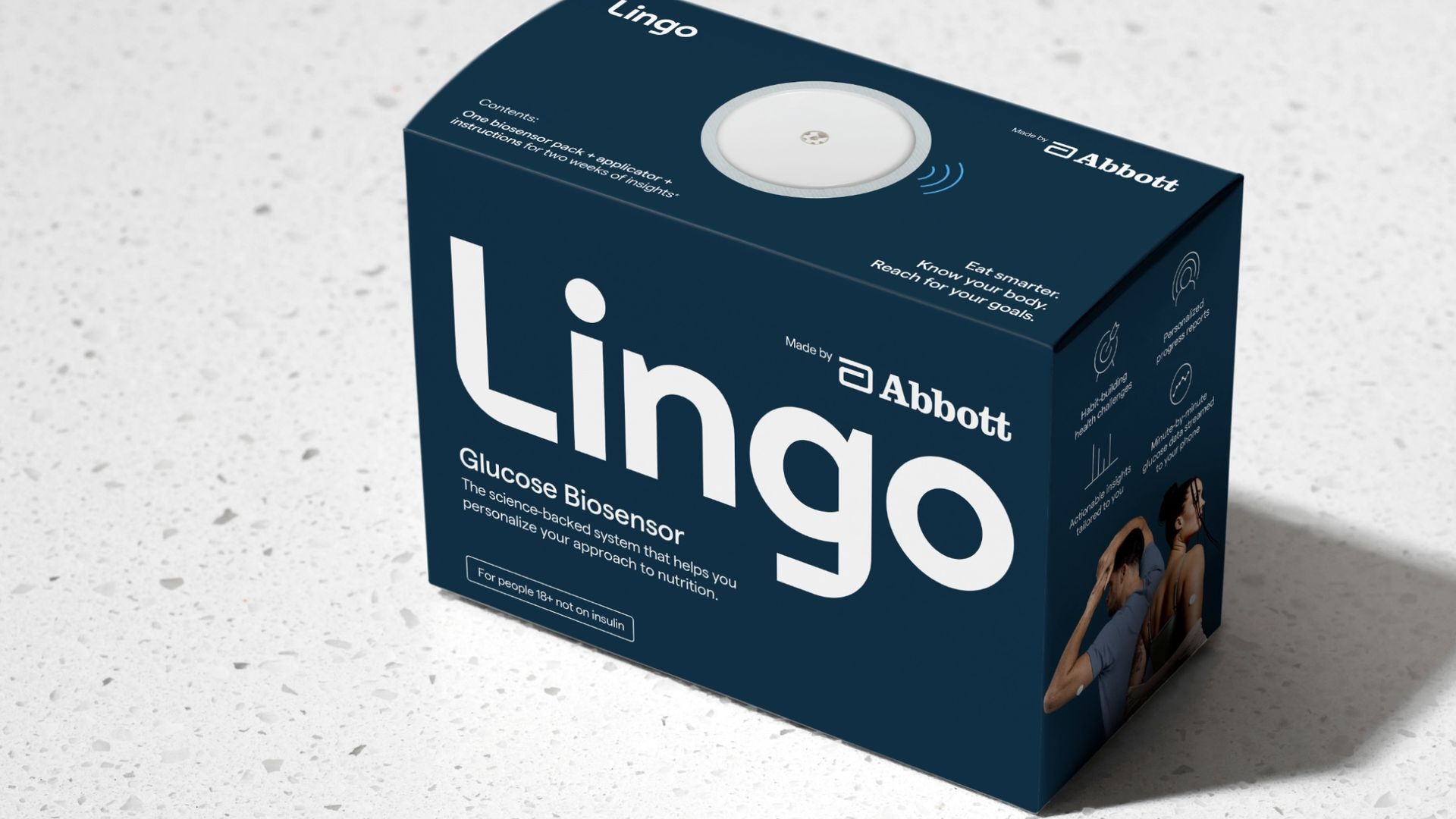 Blue box of Lingo glucose biosensor by Abbott on a speckled white surface with a white circular sensor device in front of the box.