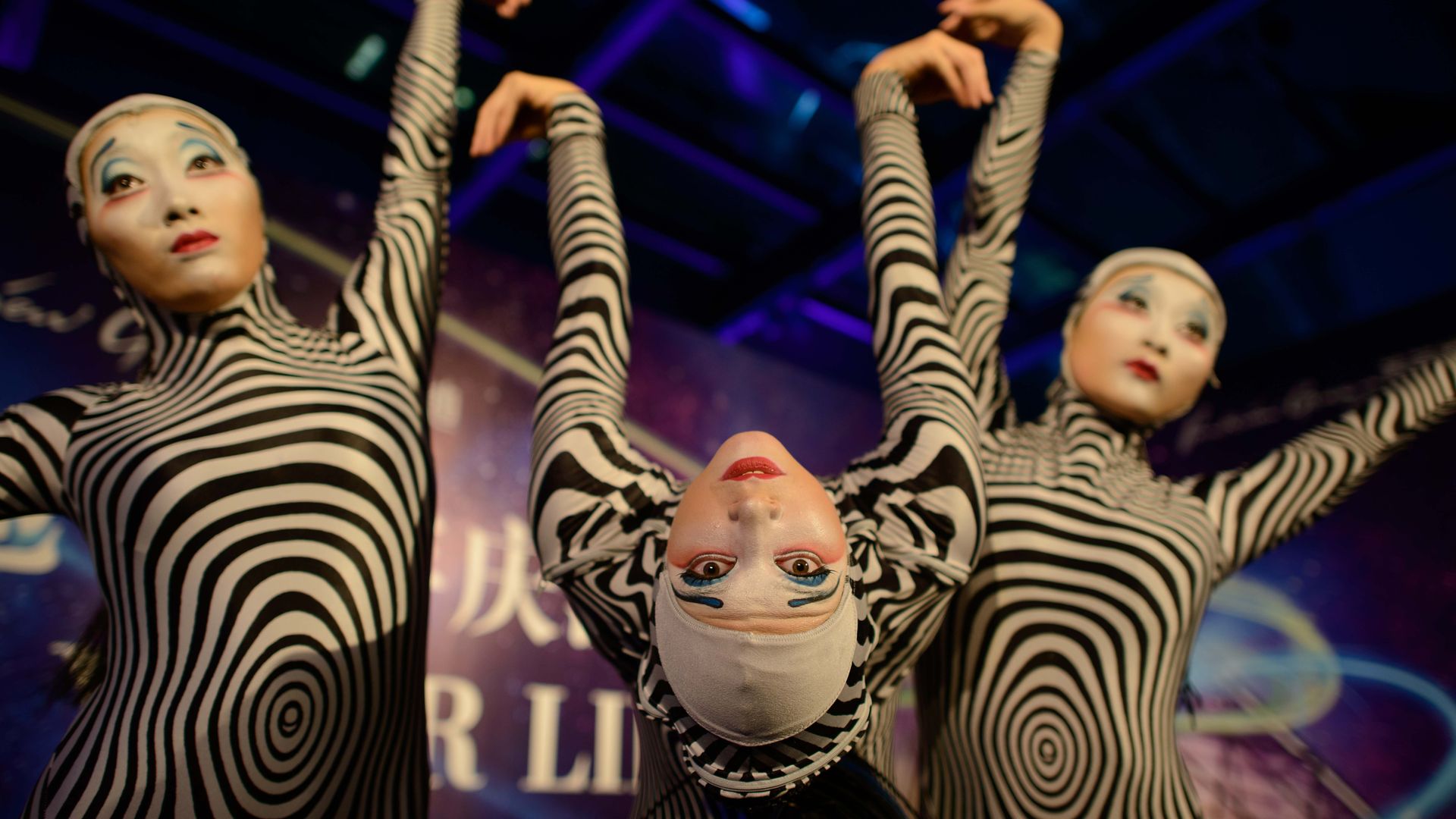 Performers from Cirque du Soleil pose outside a gala event in Beijing