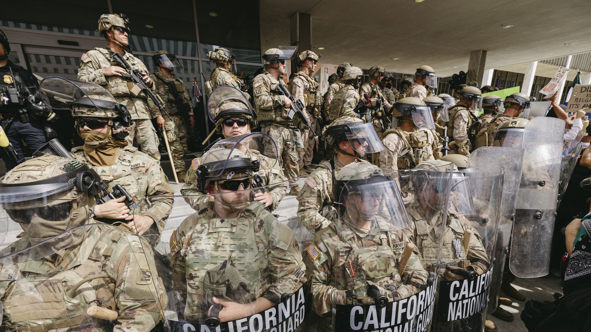 California National Guard members stand in formation during the protest in Los Angeles, California on June 14, 2025. Masses of demonstrators filled streets, parks, and plazas across the United States to protest President Donald Trump. Organized as part of the nationwide "No Kings" movement, the prot
