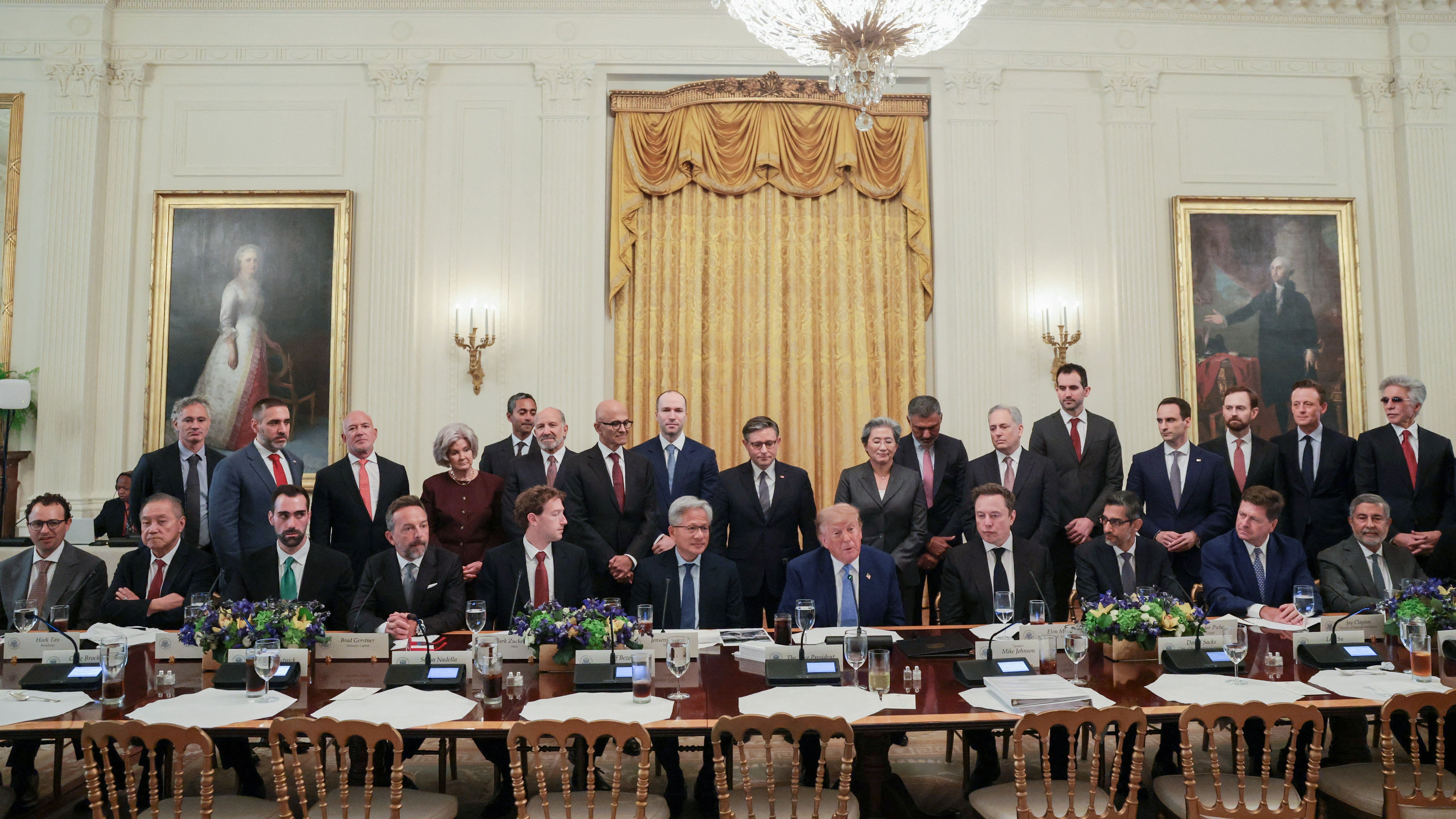 Trump and more than 20 AI leaders and administration officials gather on one side of a long dining table