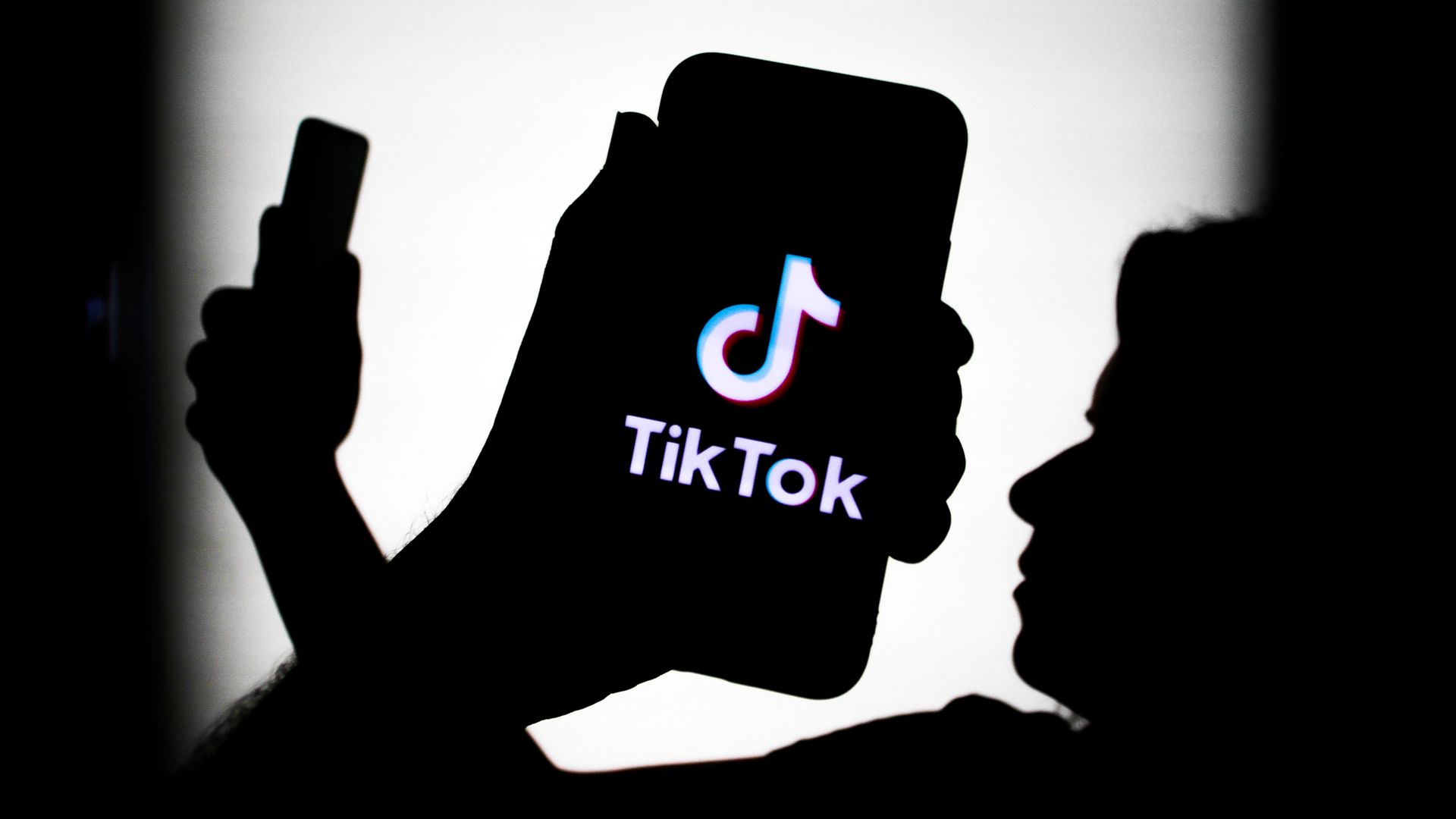 TikTok logo displayed on a phone screen is seen in this illustration photo taken in Krakow, Poland on July 18, 2021