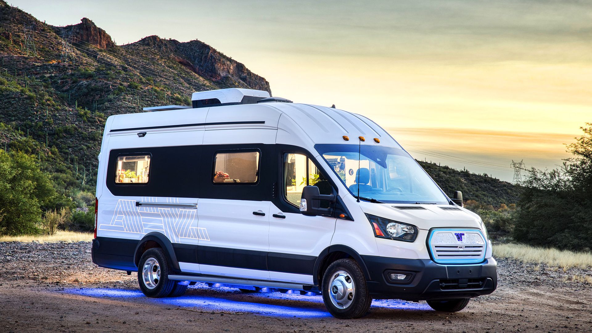 A van driving through the mountains 