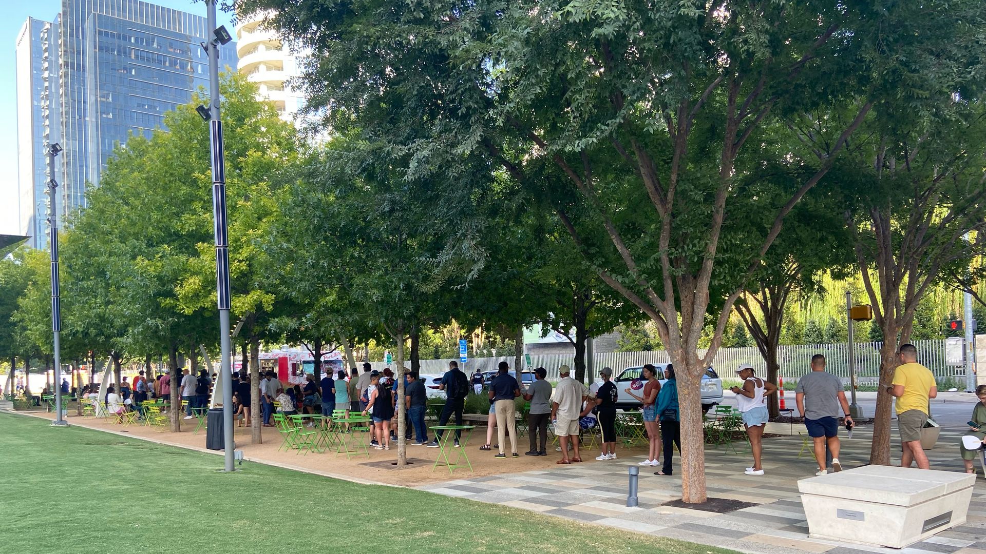 A lot of people lined up in a park