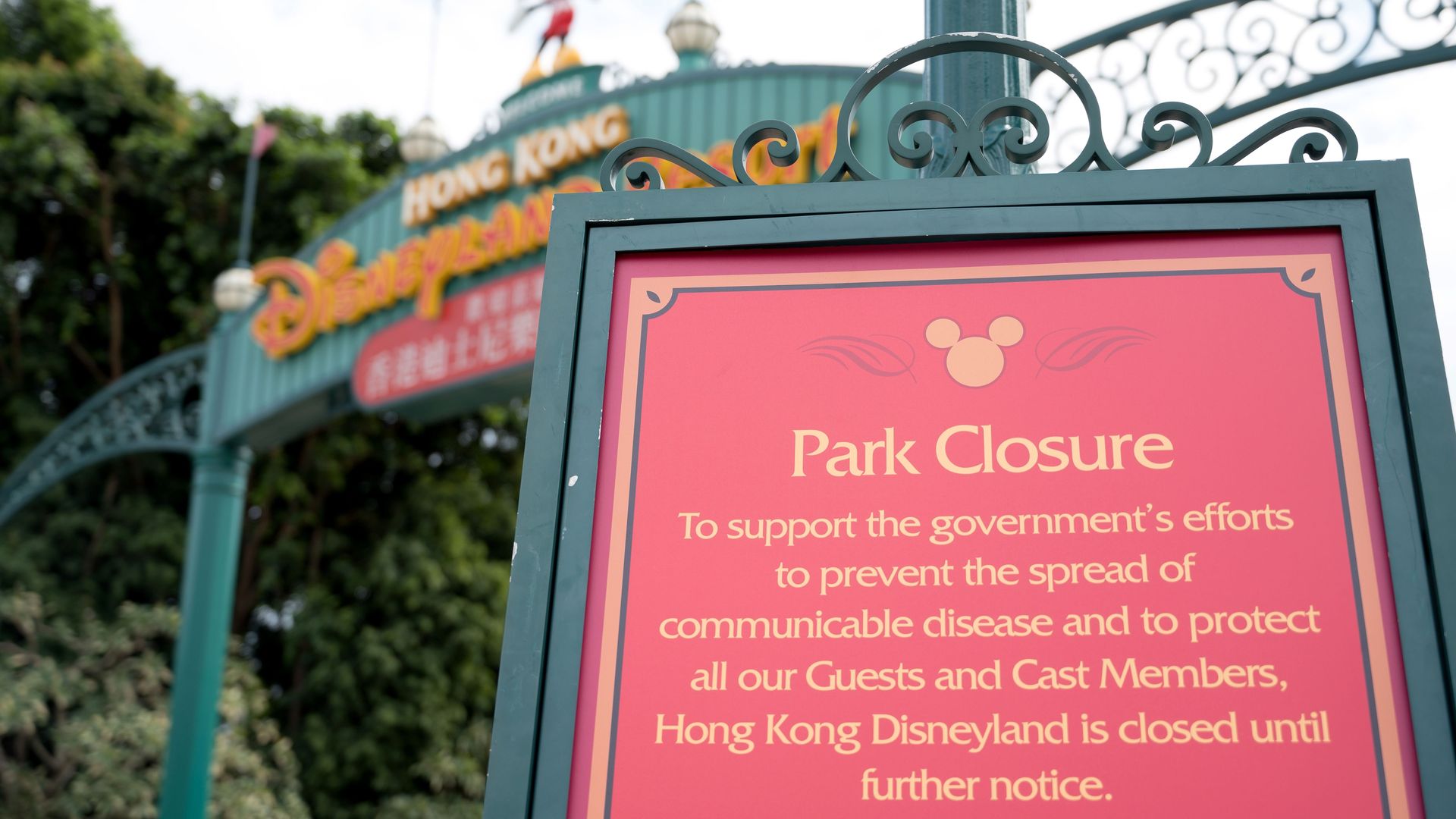 A sign outside of Hong Kong Disneyland announcing the park's closure due to the coornavirus