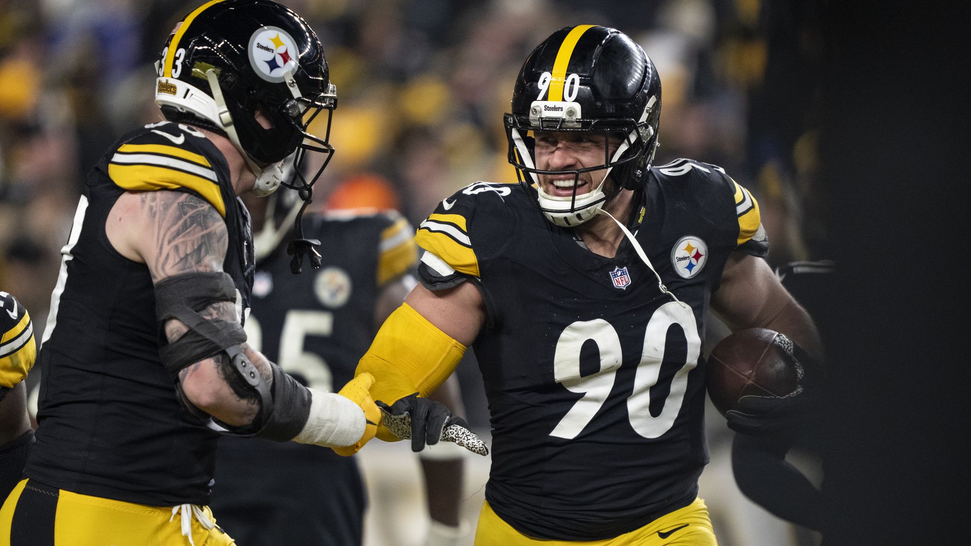 PITTSBURGH, PENNSYLVANIA - JANUARY 4: T.J. Watt #90 of the Pittsburgh Steelers celebrates with his teammates after intercepting a pass during an NFL football game against the Baltimore Ravens at Acrisure Stadium on January 04, 2026 in Pittsburgh, Pennsylvania. (Photo by Michael Owens/Getty Images)