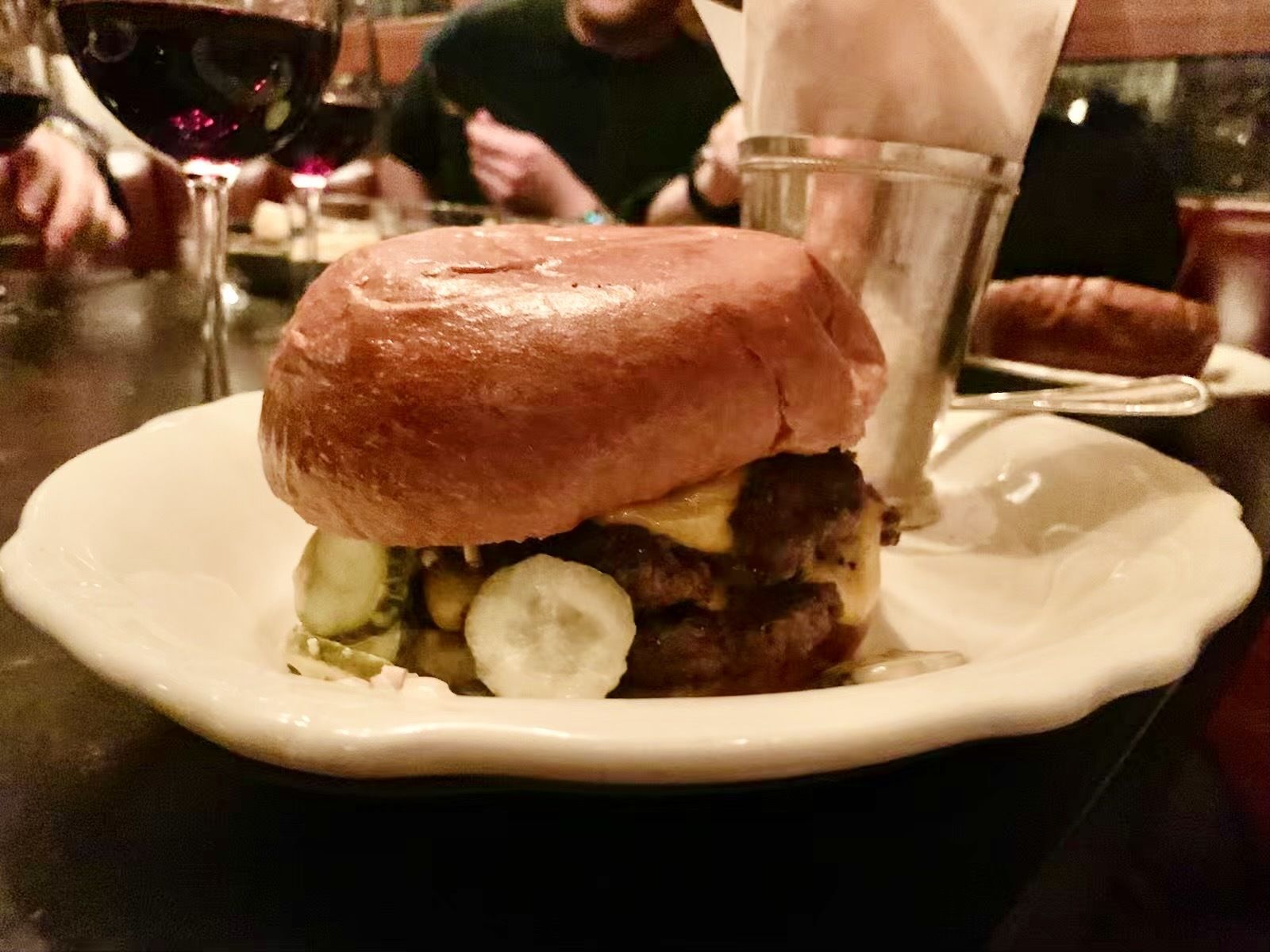 Photo of a cheeseburger on a plate 