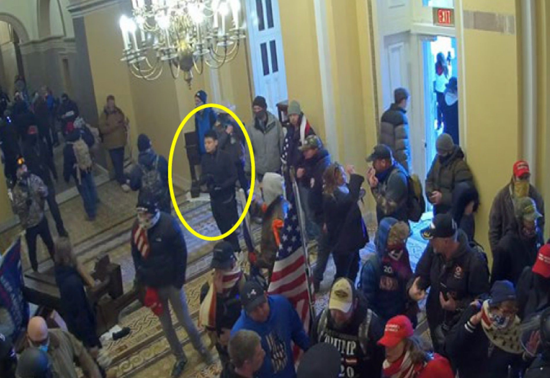 Circle around an image of a man, whom the FBI allege is Kevin Alstrup,  inside the U.S. Capitol.