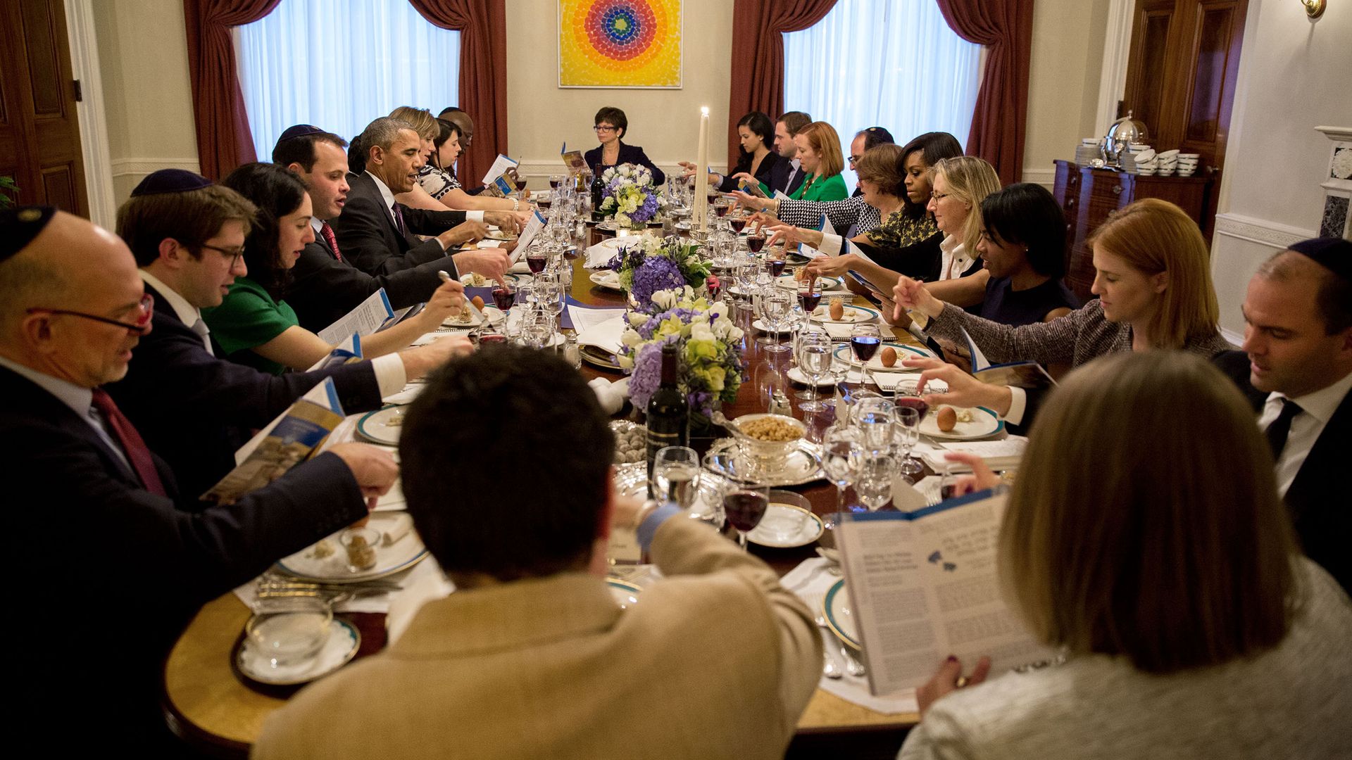 President Barack Obama holds a Passover seder at the White House around a big dining table. 