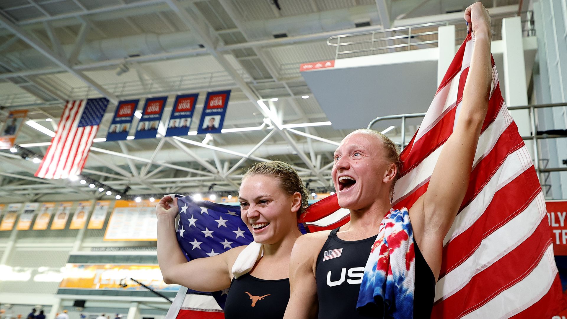 Two divers celebrate making the U.S. Olympic team.