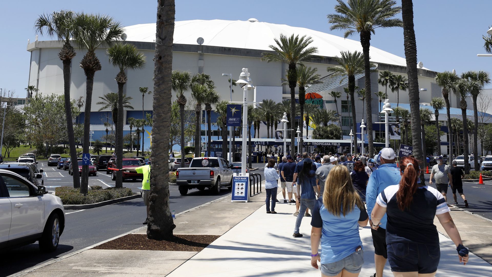 fans walking outside tropicana field