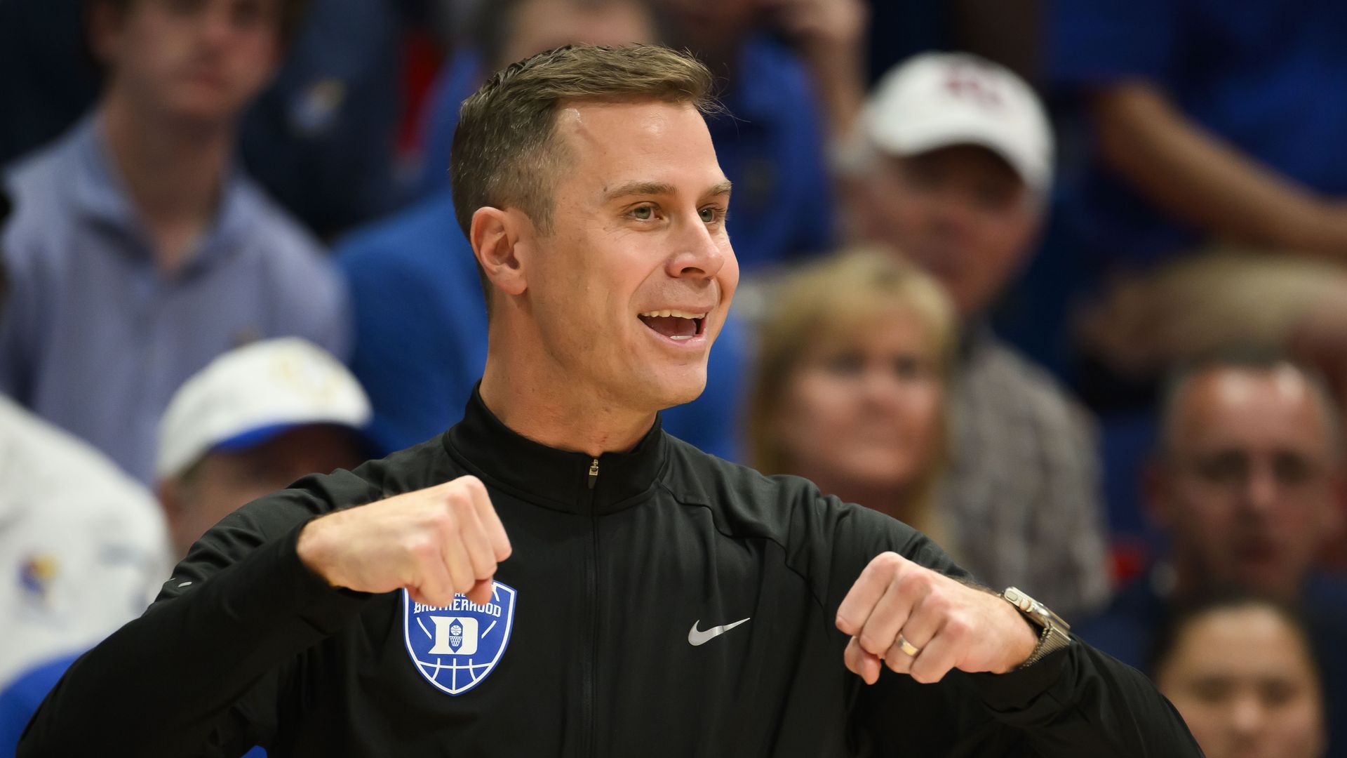 LAWRENCE, KANSAS - OCTOBER 25: Jon Scheyer of the Duke Blue Devils reacts during the first half of an exhibition game against the Kansas Jayhawks at Allen Fieldhouse on October 25, 2026 in Lawrence, Kansas. (Photo by Reed Hoffmann/Getty Images)