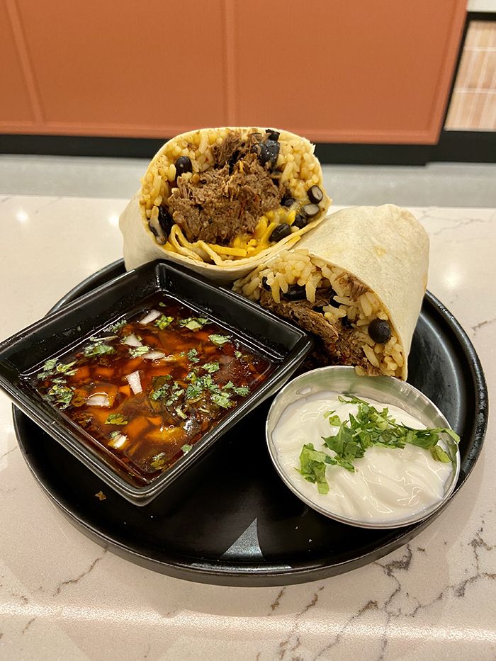 Rolled AF birria burrito. Burritos start at $8. Photo: Ashley Mahoney/Axios