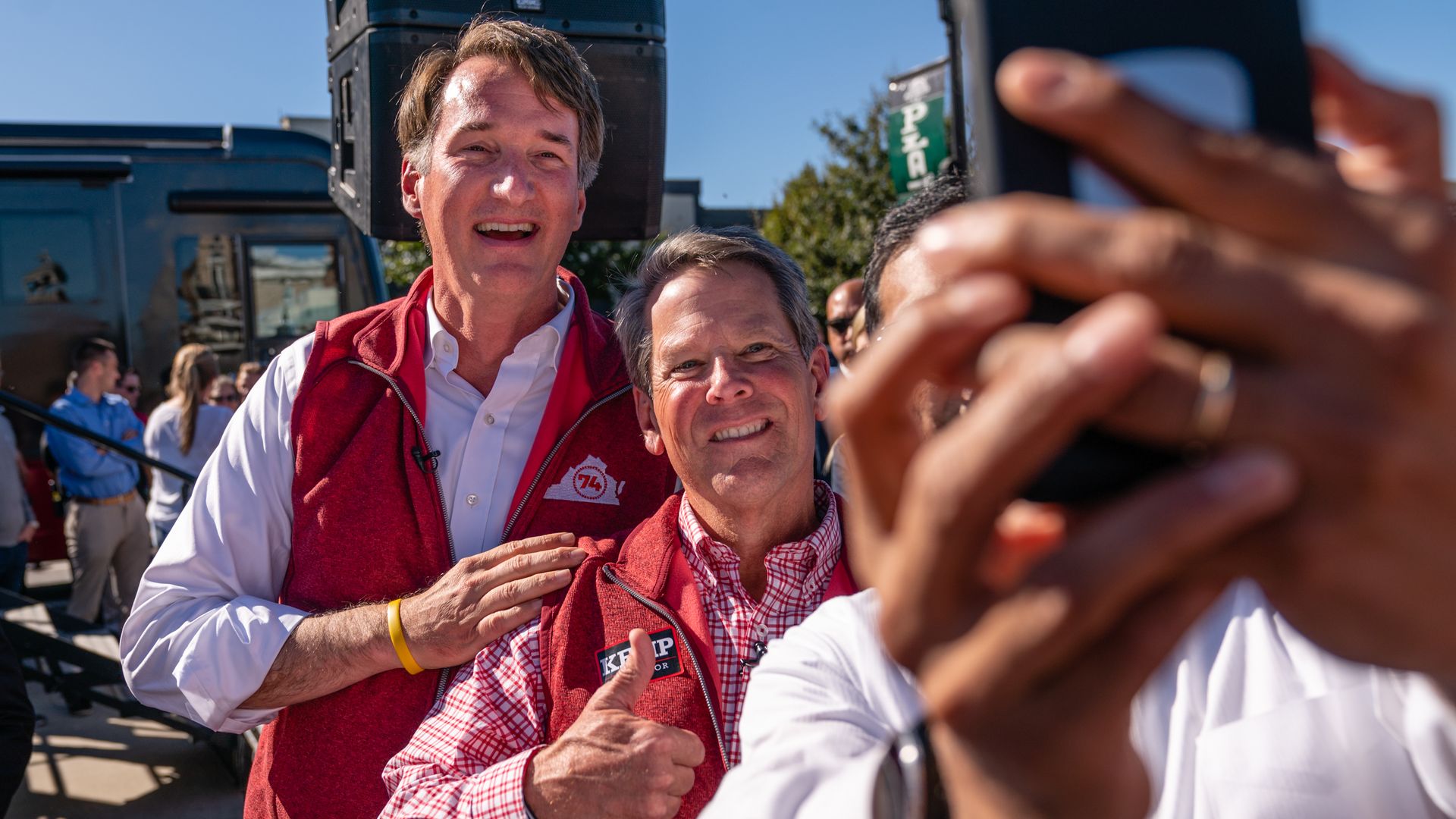 Glenn Youngkin and Brian Kemp smiling for a photo