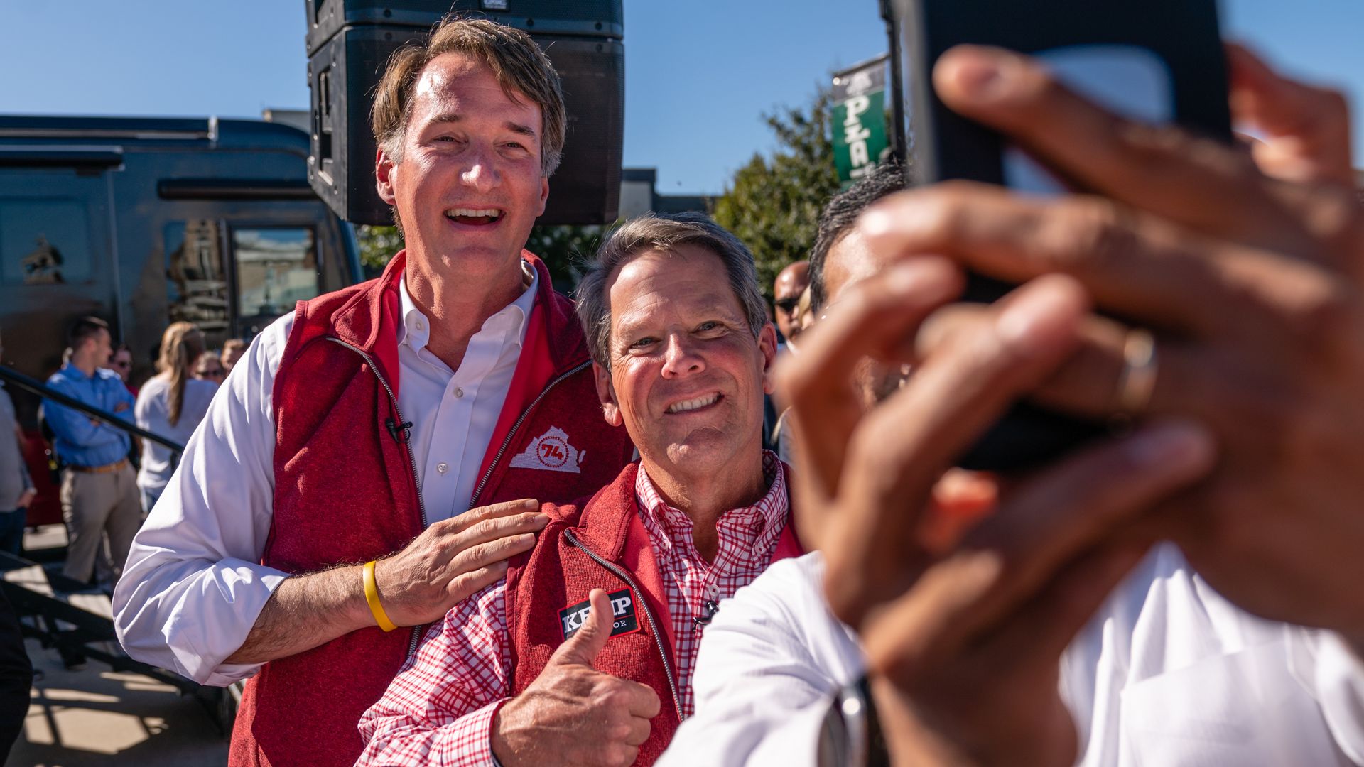 Glenn Youngkin and Brian Kemp smiling for a photo