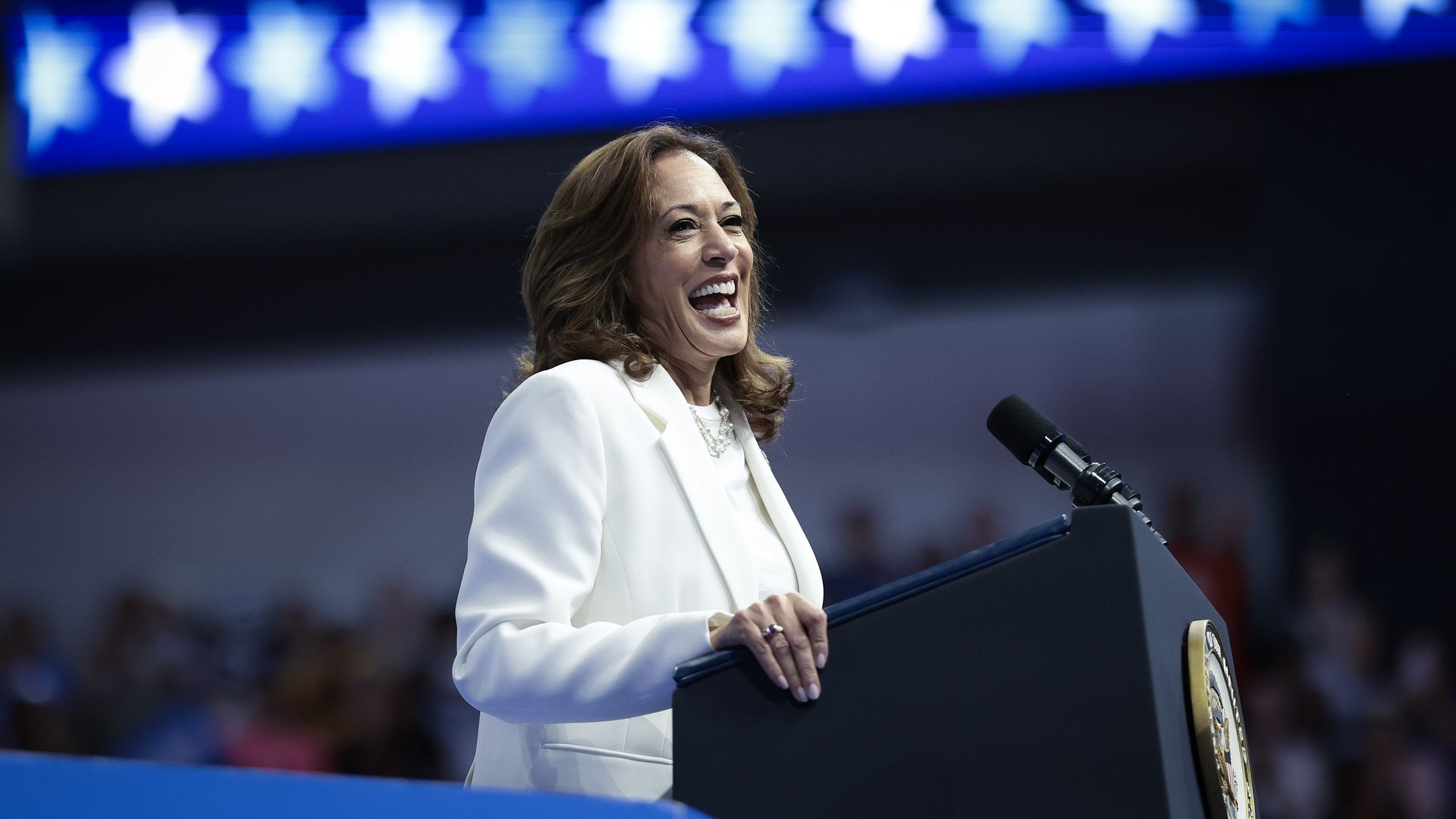 emocratic presidential nominee, U.S. Vice President Kamala Harris reacts to members of a cheering crowd as she arrives on stage at a campaign rally at the Enmarket Arena August 29, 2024 in Savannah, Georgia. 