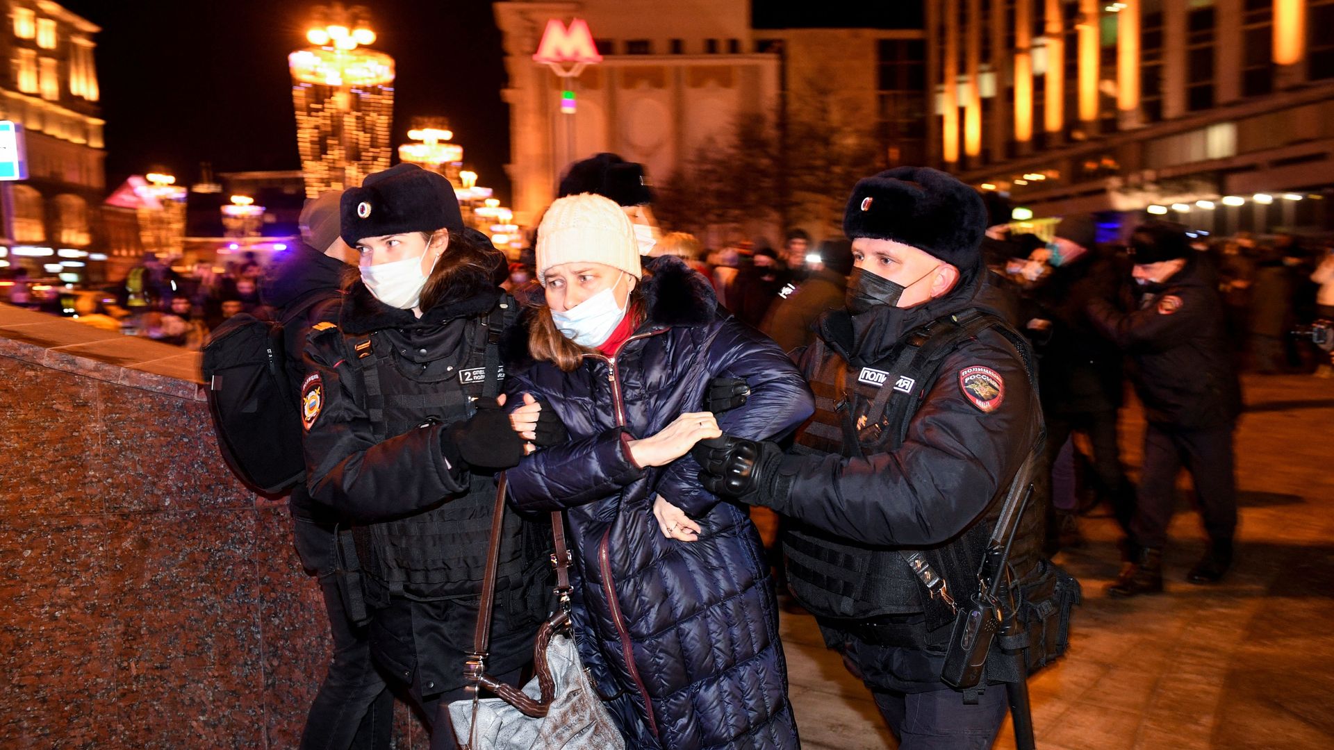 Police officers detain a demonstrator during a protest against Russia's invasion of Ukraine in Moscow on February 24