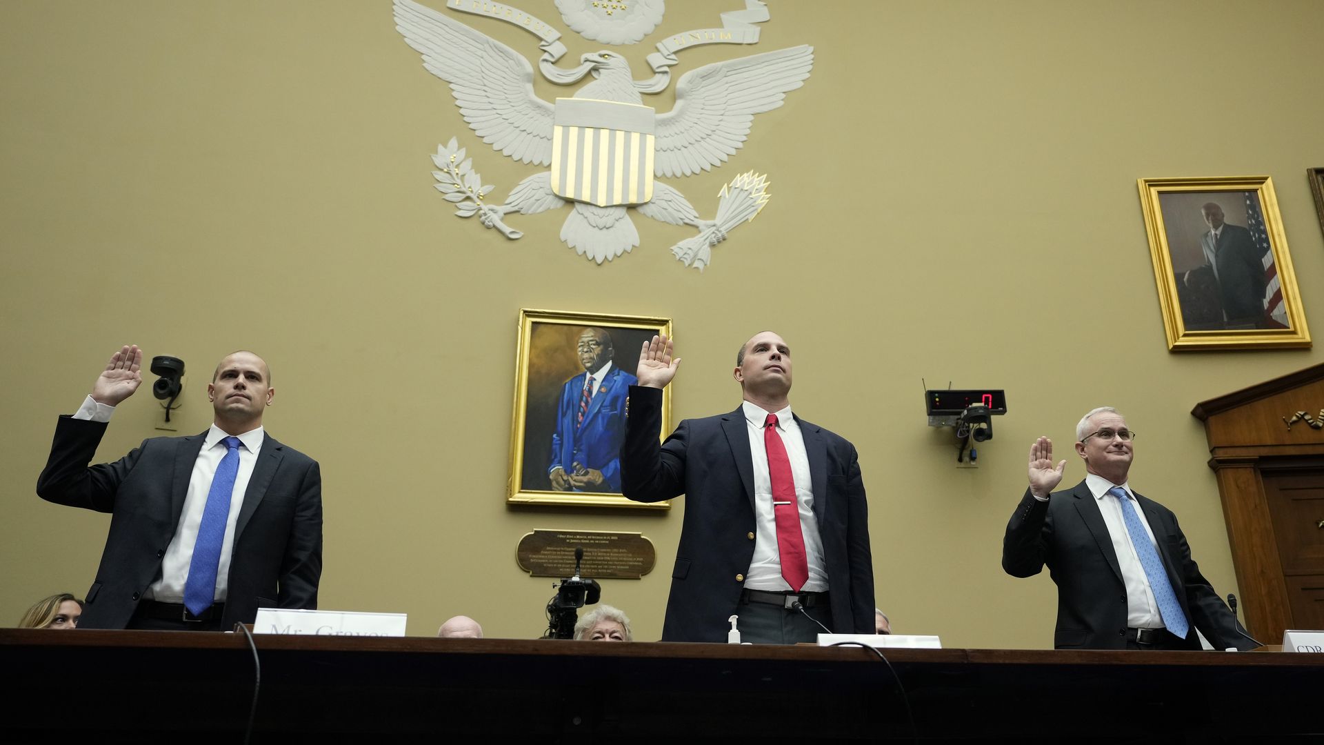 Witnesses are sworn in at a hearing