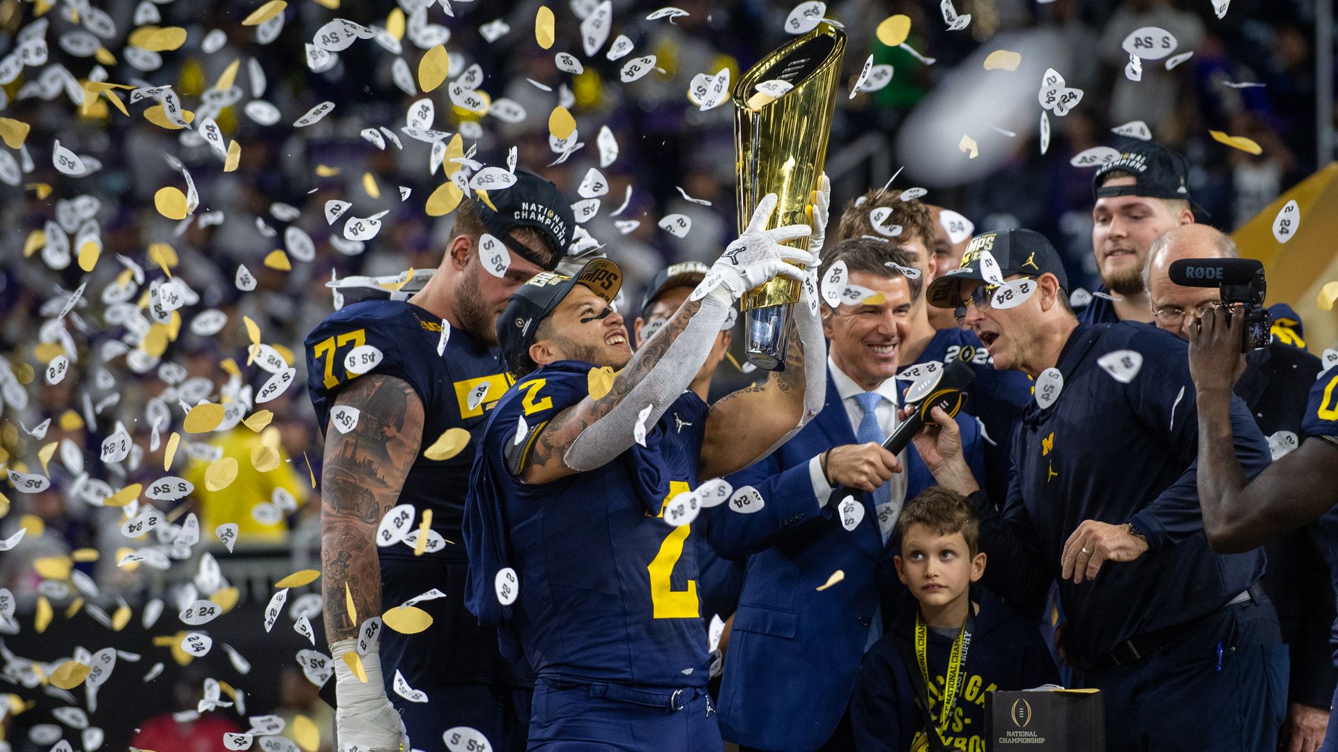 Michigan players celebrate the school's national championship 