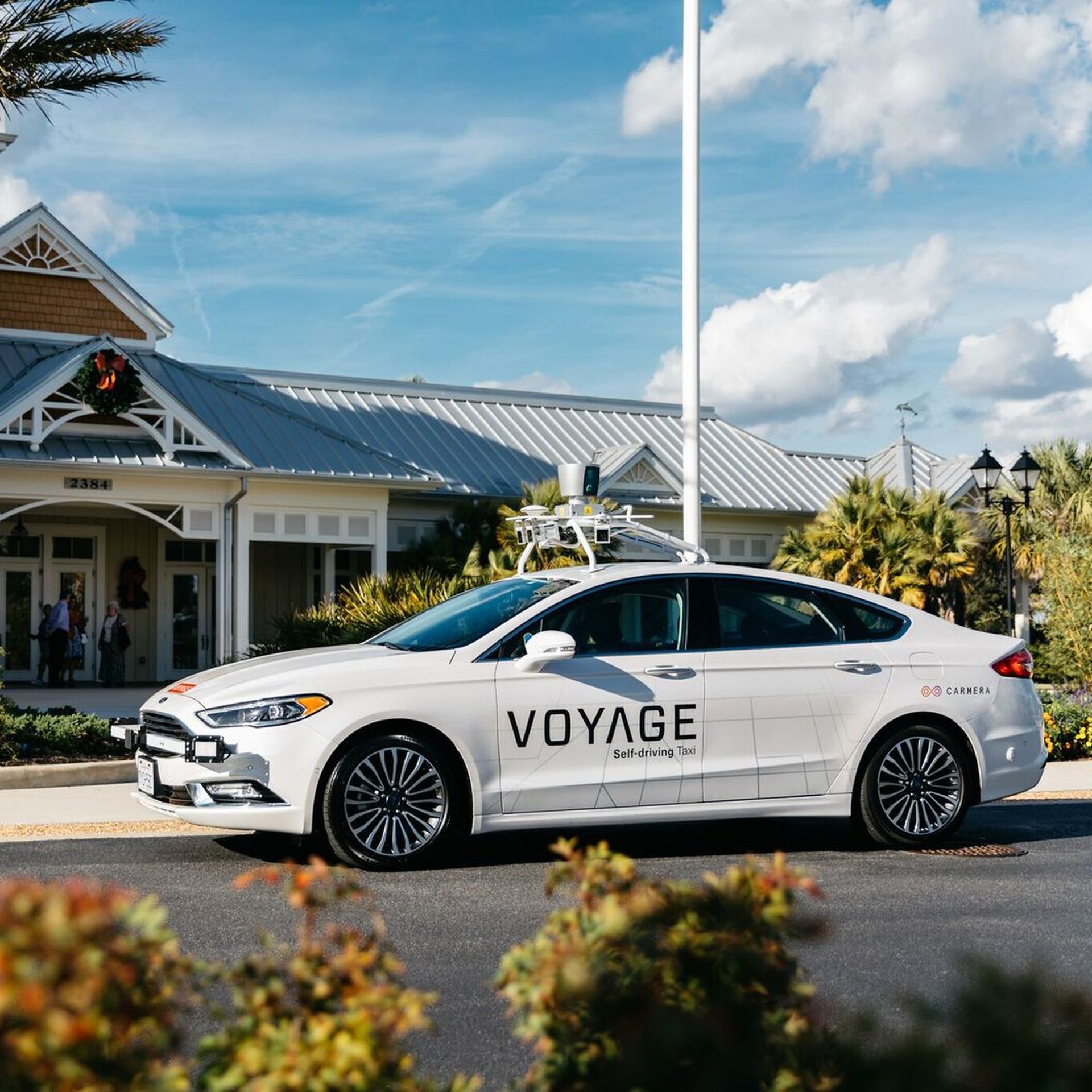 Voyage low-speed AV parked in a Florida retirement community