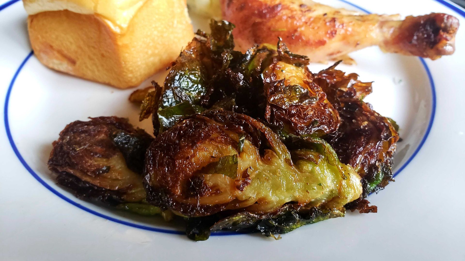 Photo of a plate of food, including Brussels sprouts.