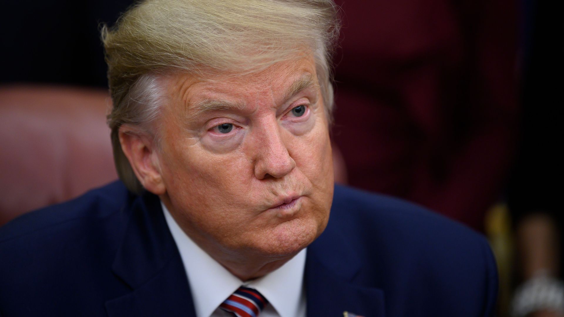 This is a photo of Donald Trump looking quizzical. 