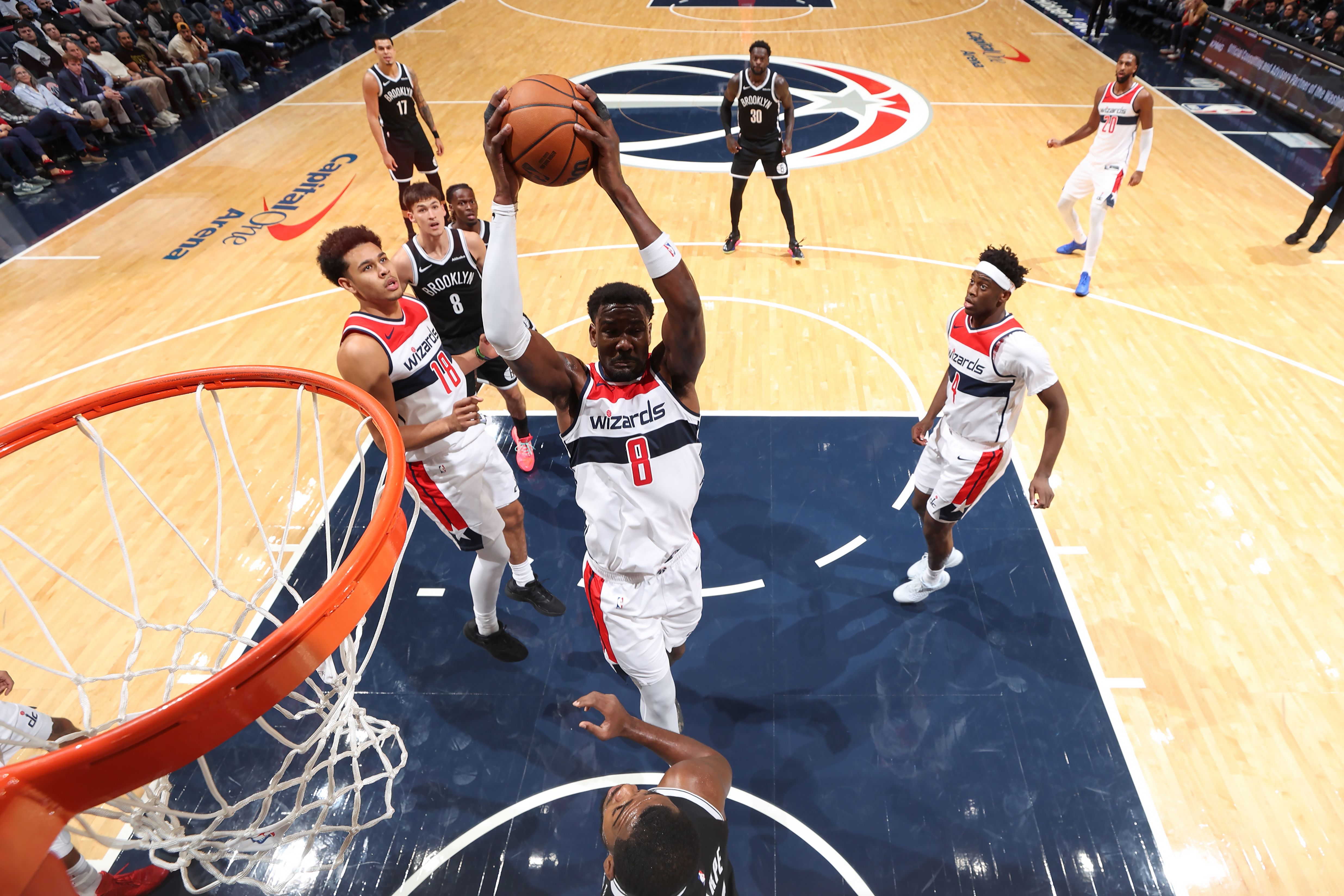 WASHINGTON, DC - OCTOBER 12: Deandre Ayton #8 of the Washington Wizards drives to the basket during the game against the Brooklyn Nets on October 12, 2026 at Capital One Arena in Washington, DC. NOTE TO USER: User expressly acknowledges and agrees that, by downloading and or using this Photograph,