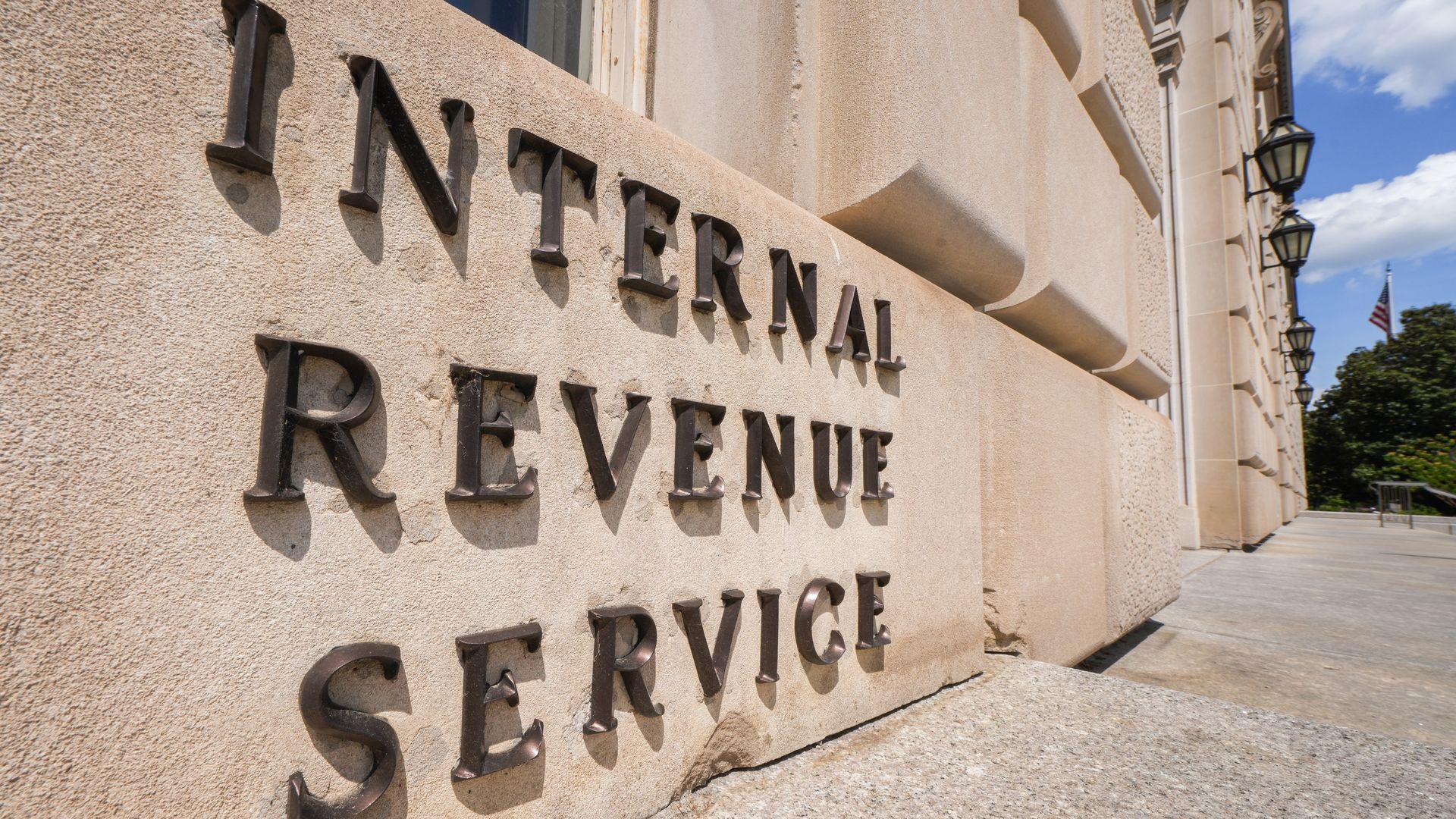 A sign outside the IRS building reads Internal Revenue Service