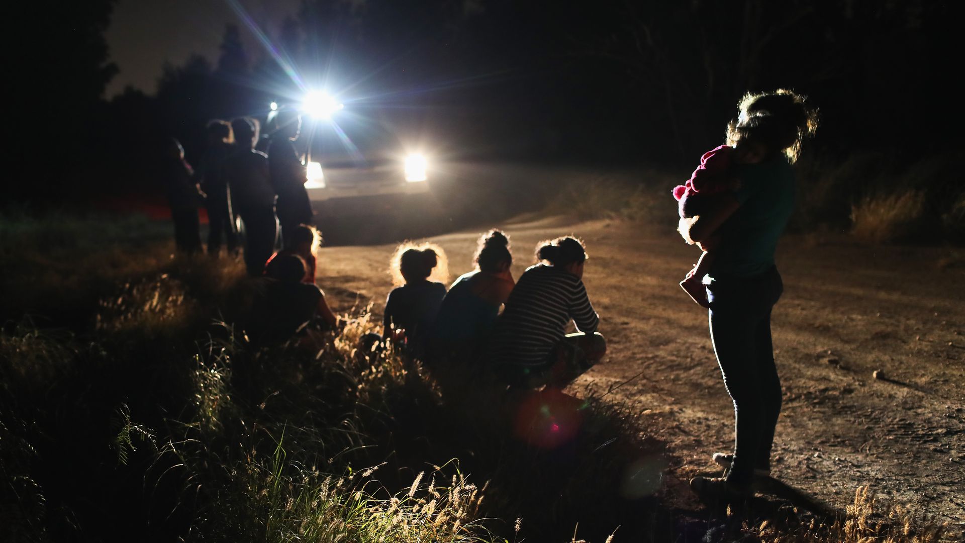 U.S. Border Patrol agents arrive to detain a group of Central American asylum seekers near the U.S.-Mexico border 