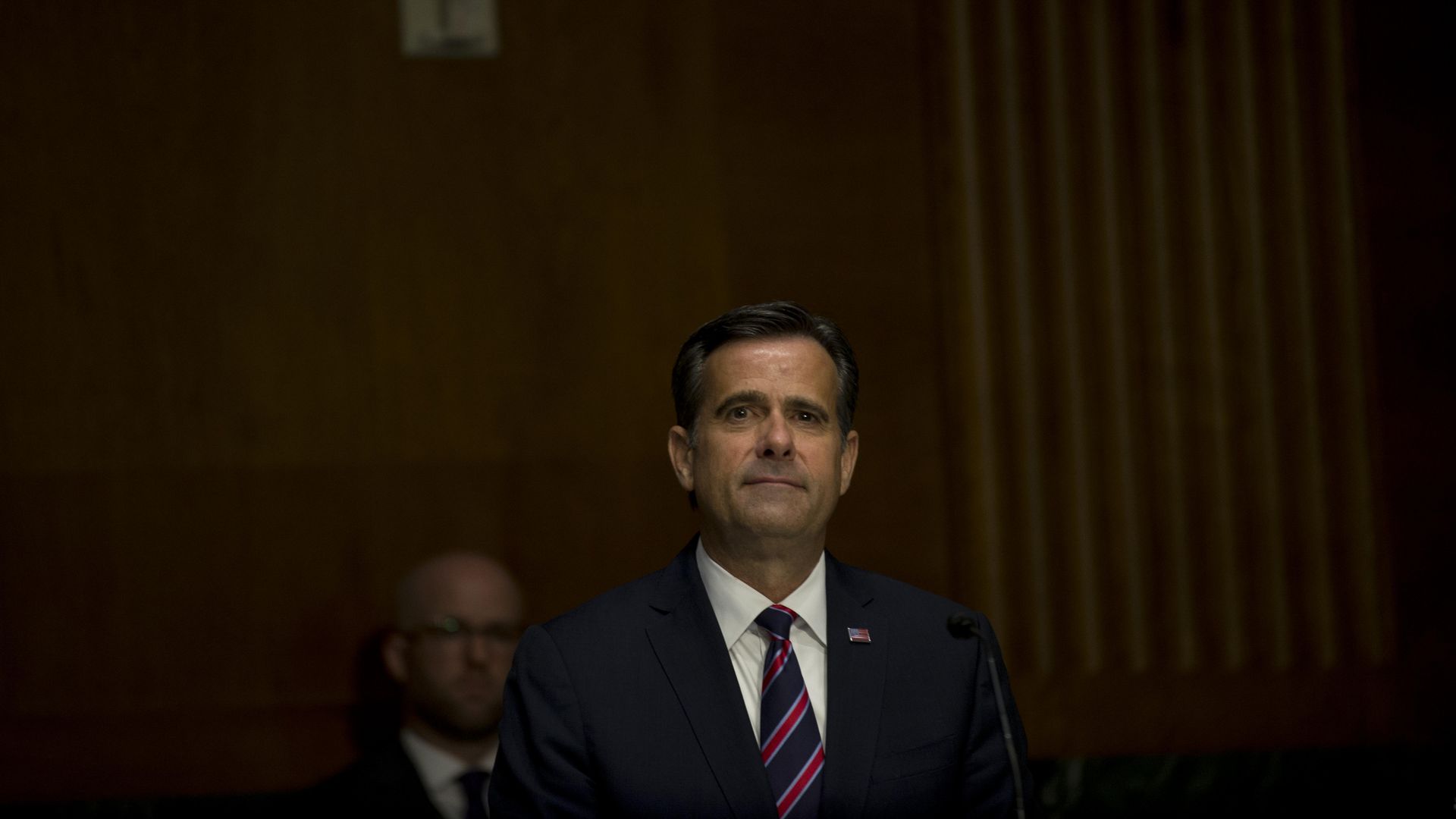 Ratcliffe in a suit and tie 