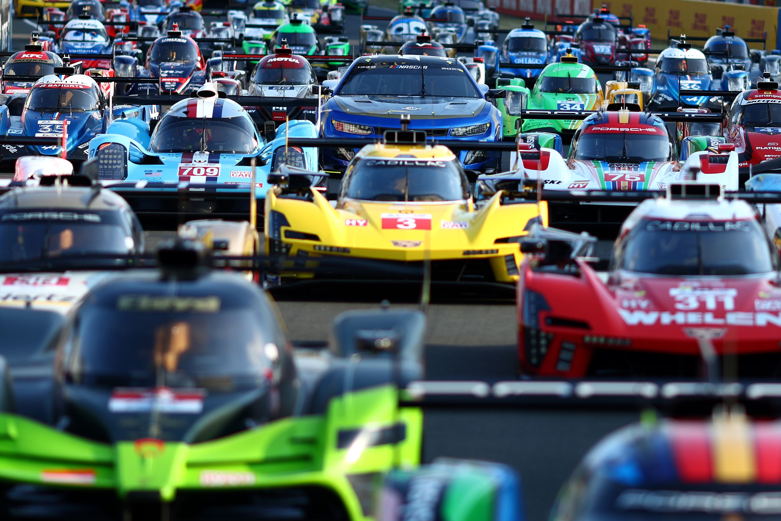 cars lined up for le mans