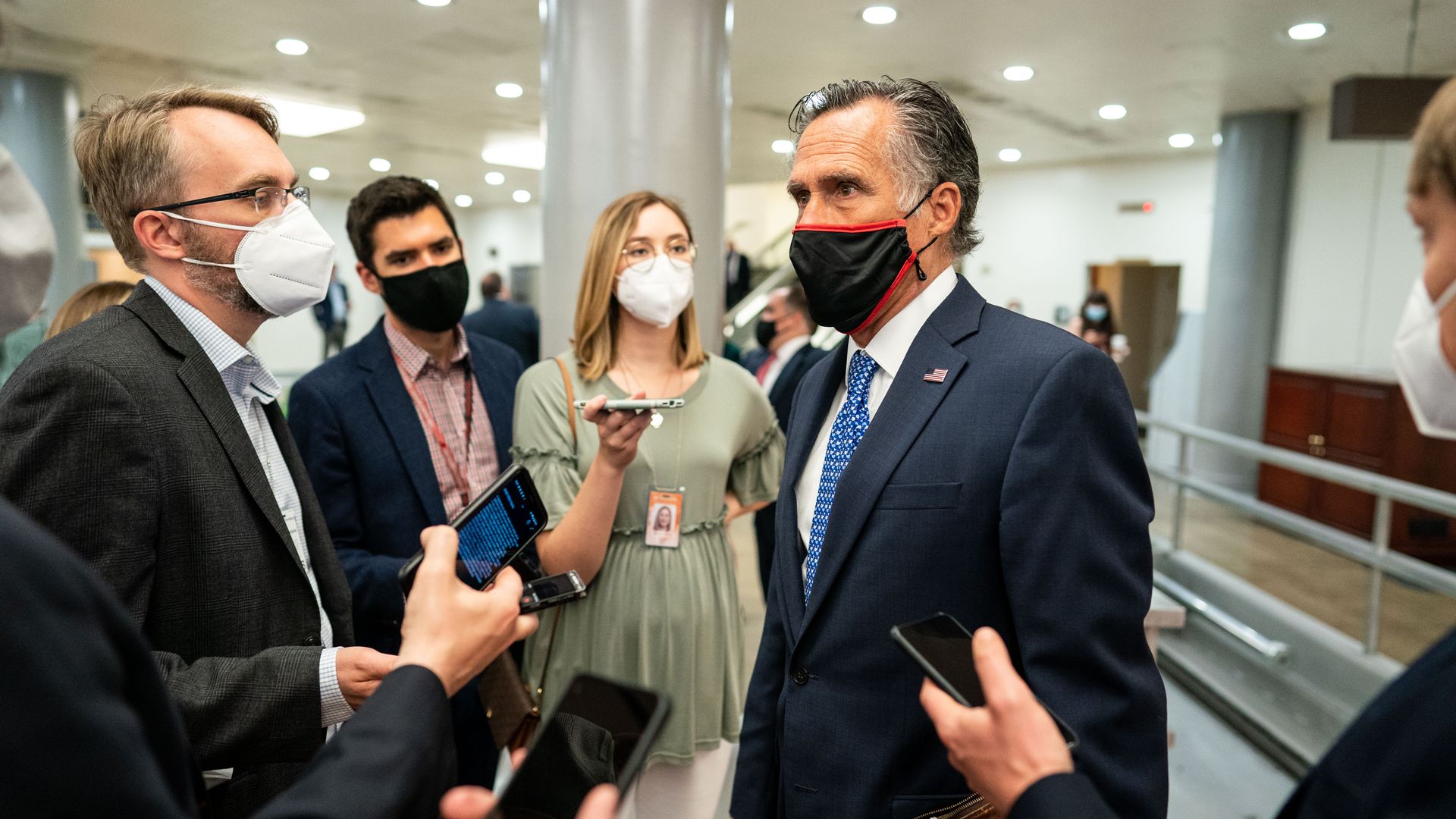 Sen. Mitt Romney speaking to reporters on Capitol Hill on April 14.