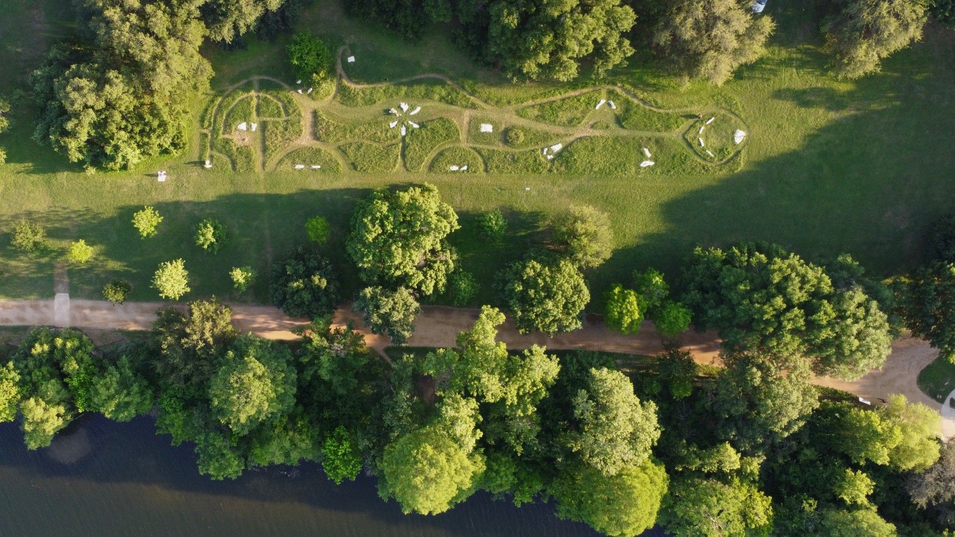 A photo of the conversation stones in the grass.