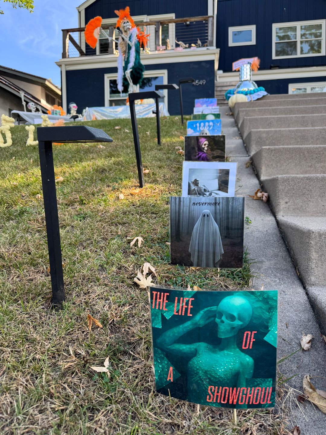 A photo of Taylor Swift album covers that are photoshopped to include ghosts and skeletons.