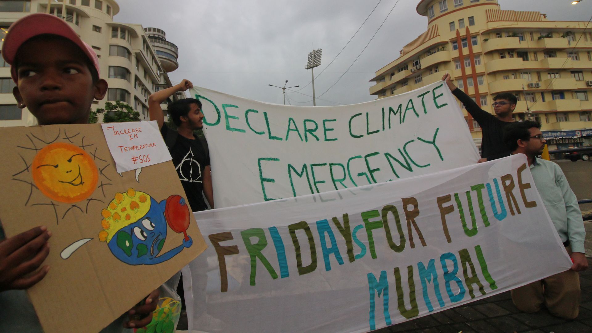 Students participate in a protest against climate change in Mumbai, India.
