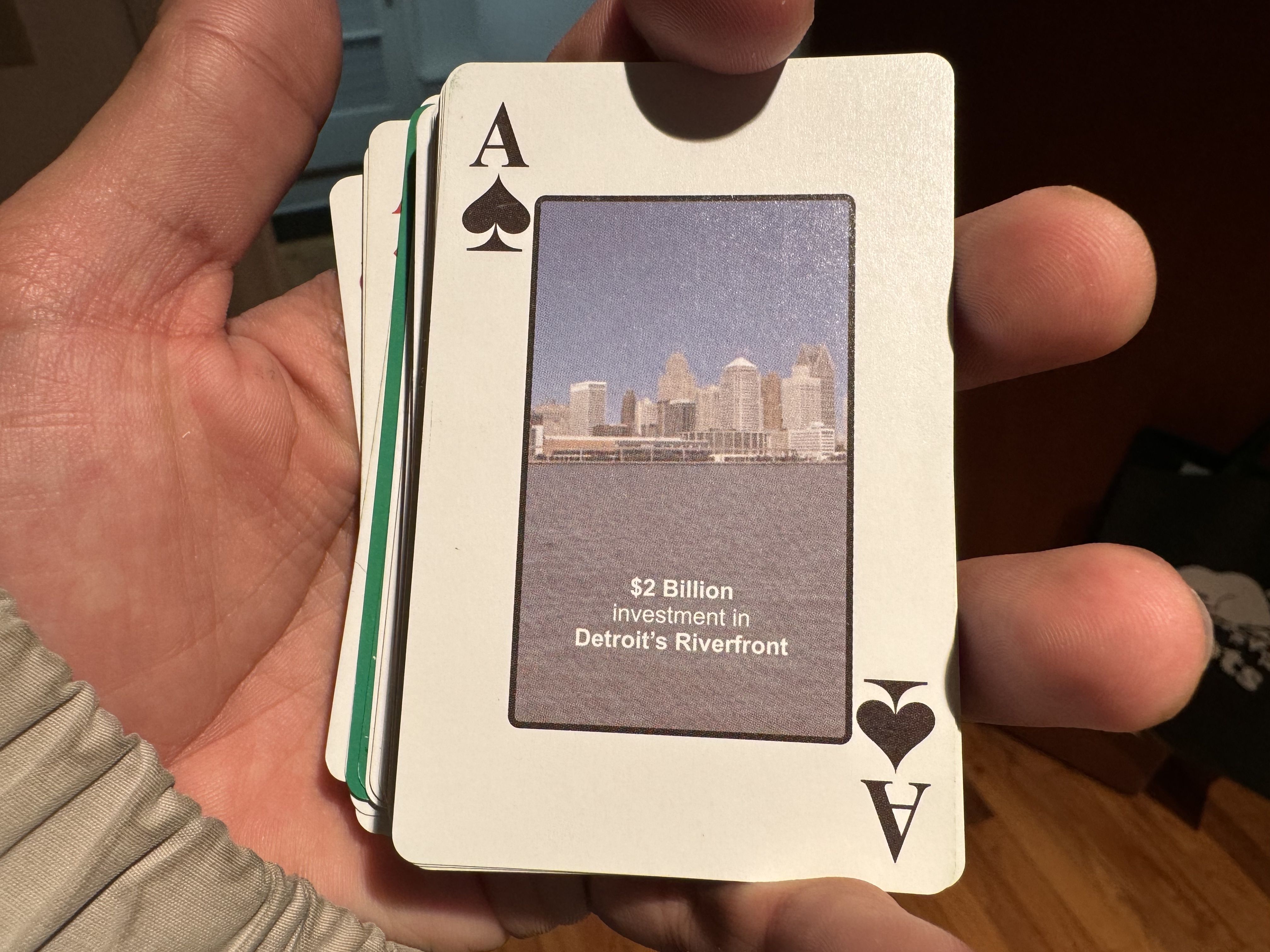 Some cards highlight accomplishments like this one of a $2 billion riverfront investment.