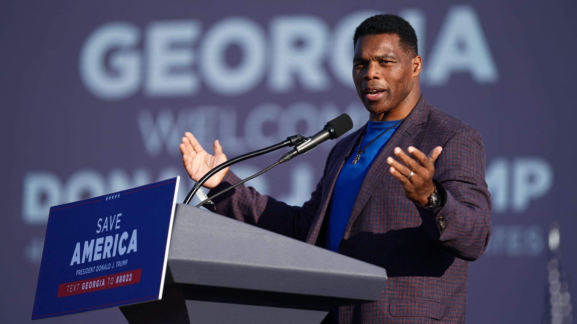 Herschel Walker speaking at a Donald Trump rally