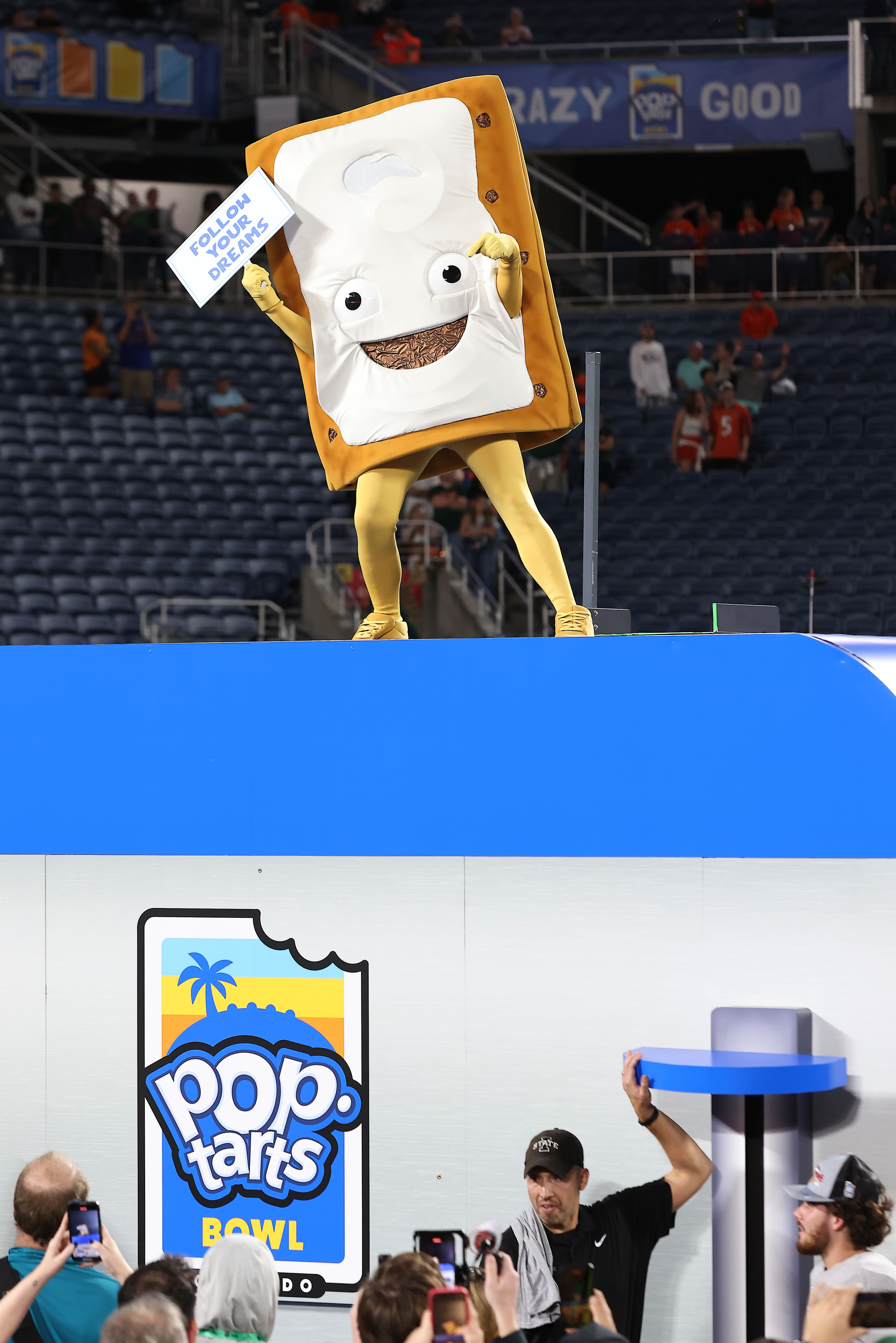 The Pop-tart mascot celebrates after the 2024 Pop-Tarts Bowl between the Iowa State Cyclones and the Miami Hurricanes at Camping World Stadium on December 28, 2024 in Orlando, Florida. (Photo by Dustin Markland/Getty Images)