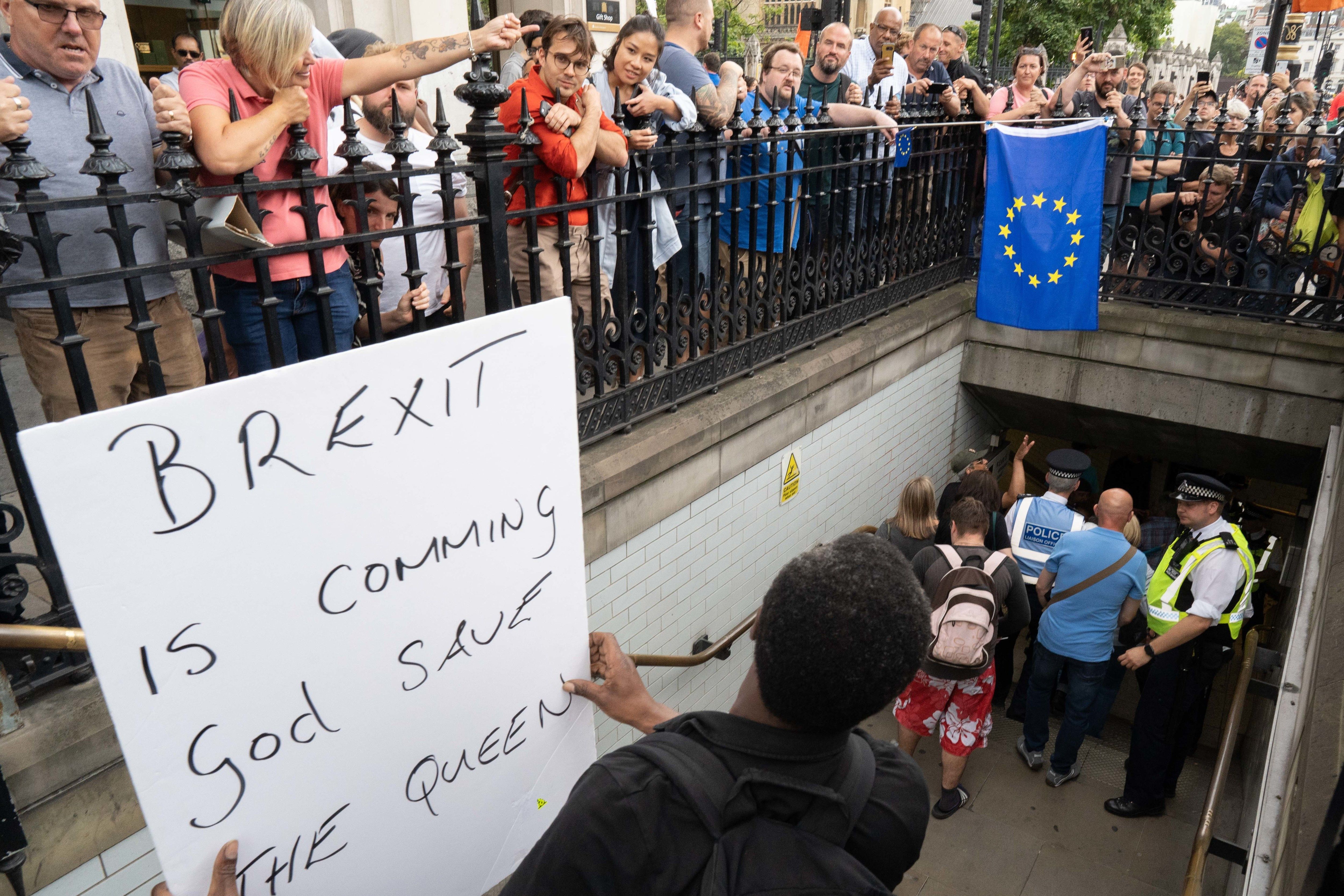 A pro-Brexit supporter with a placard during the demonstrations. 