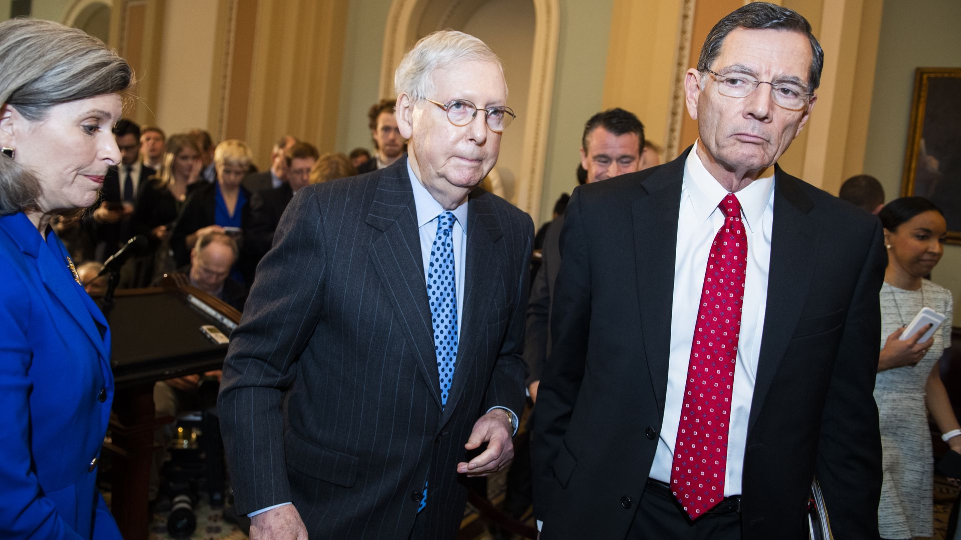 Senate Majority Leader Mitch McConnell (R-Ky.) and Sen. John Barrass (R-Wyo.)