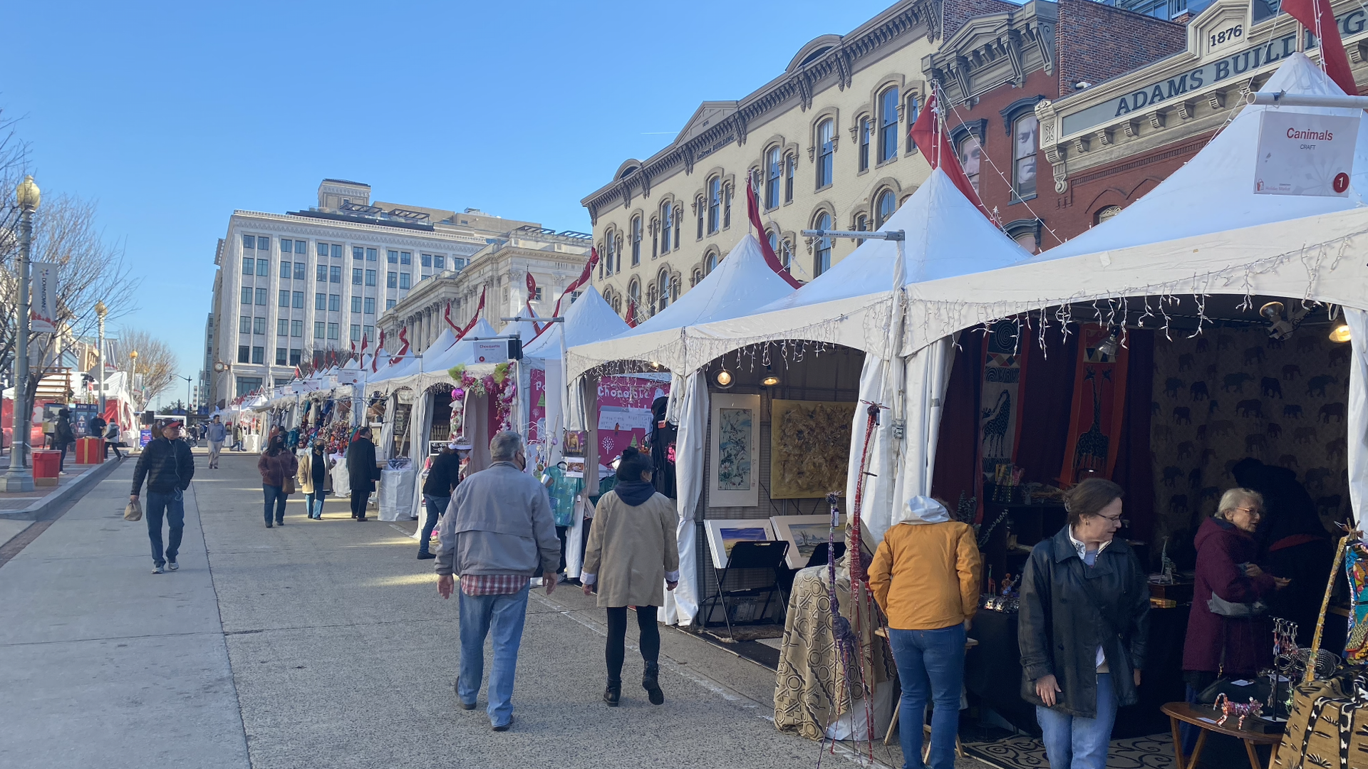 People walking around at the Downtown Holiday Market.