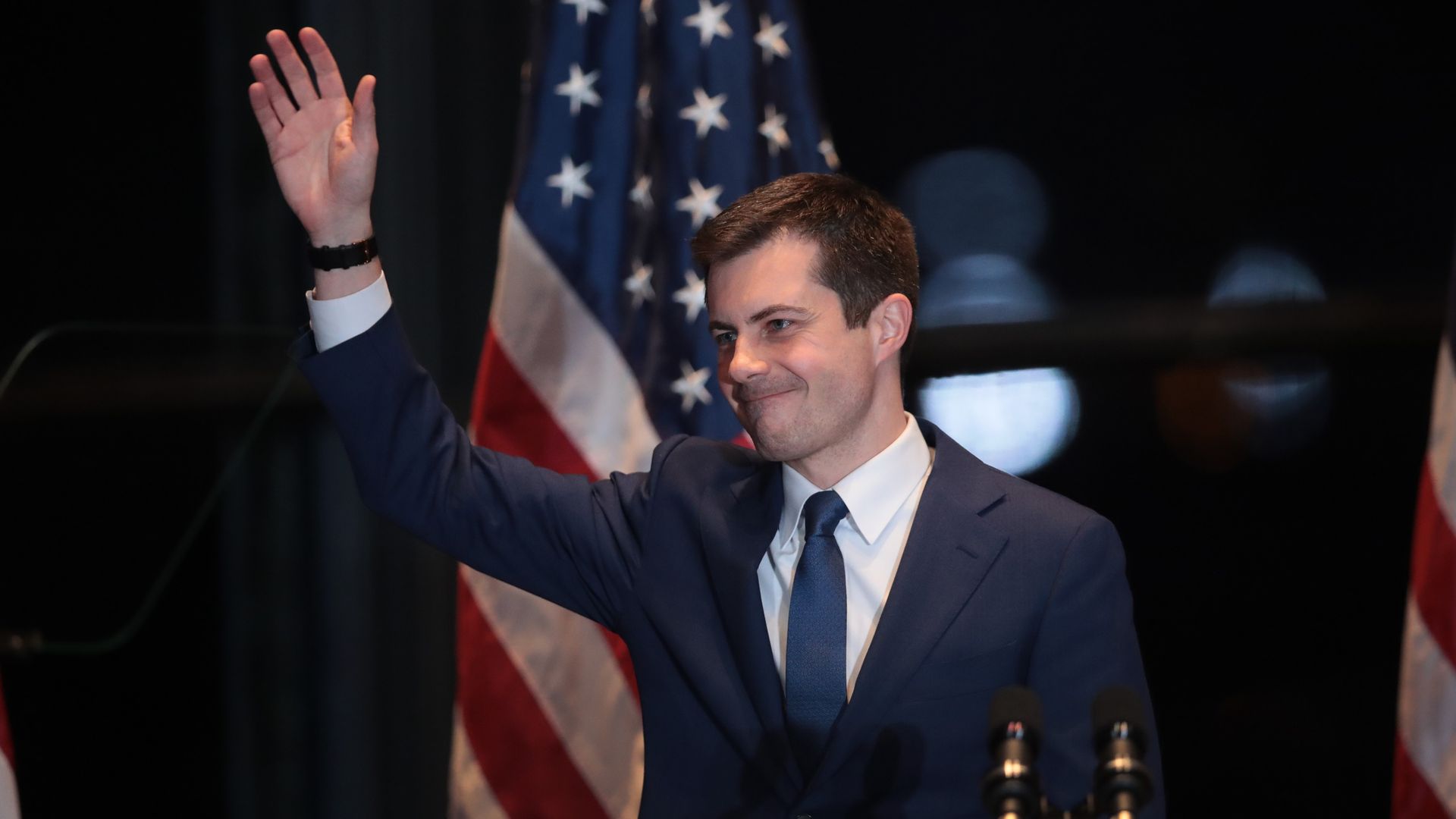 Former South Bend Mayor Pete Buttigieg waves as he concludes his presidential campaign in March.