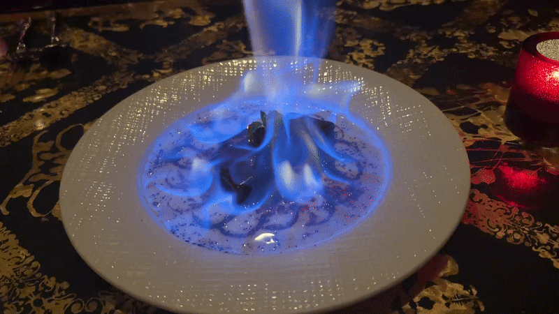 video of a chocolate cake lit on fire